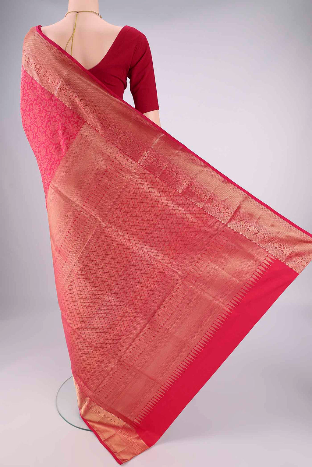 Flat view of Dark Pink Soft Silk Saree with Zari Brocade on the body and Zari Border. 