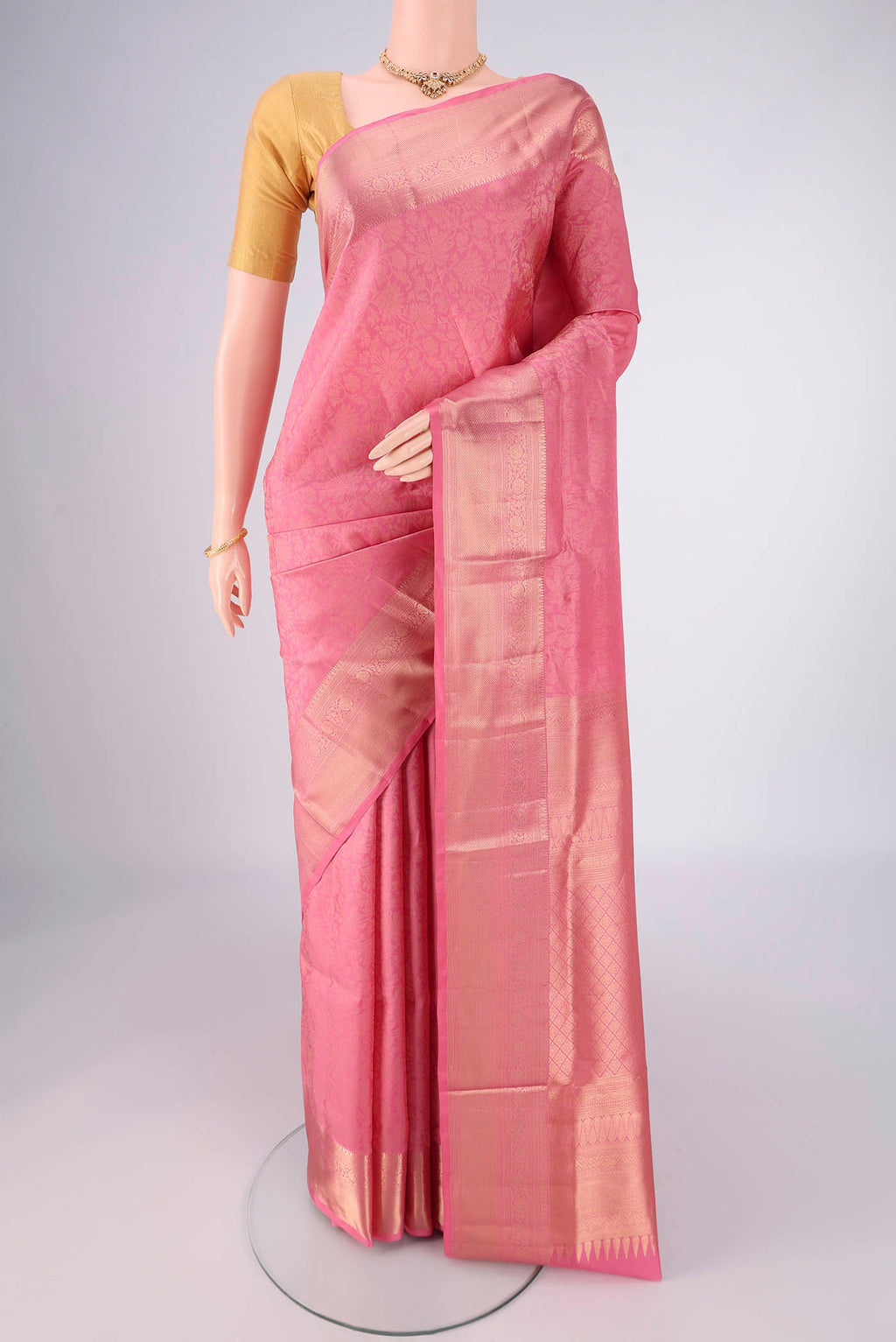 Rose pink Soft Silk Saree with Zari Brocade on the body and Zari Border.  displayed on a mannequin