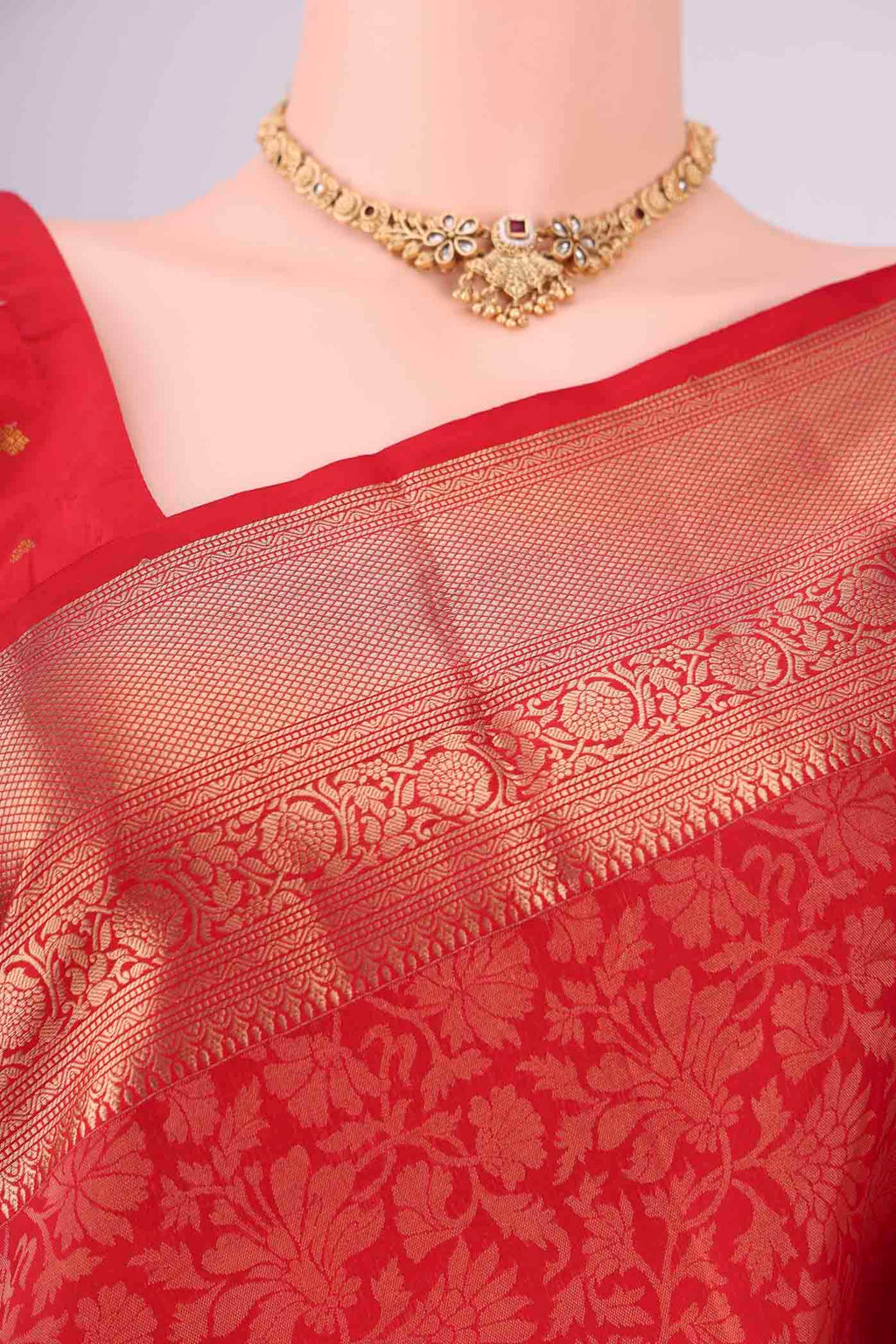 Border image of Red Soft Silk Saree with Zari Brocade on the body and Zari Border. 