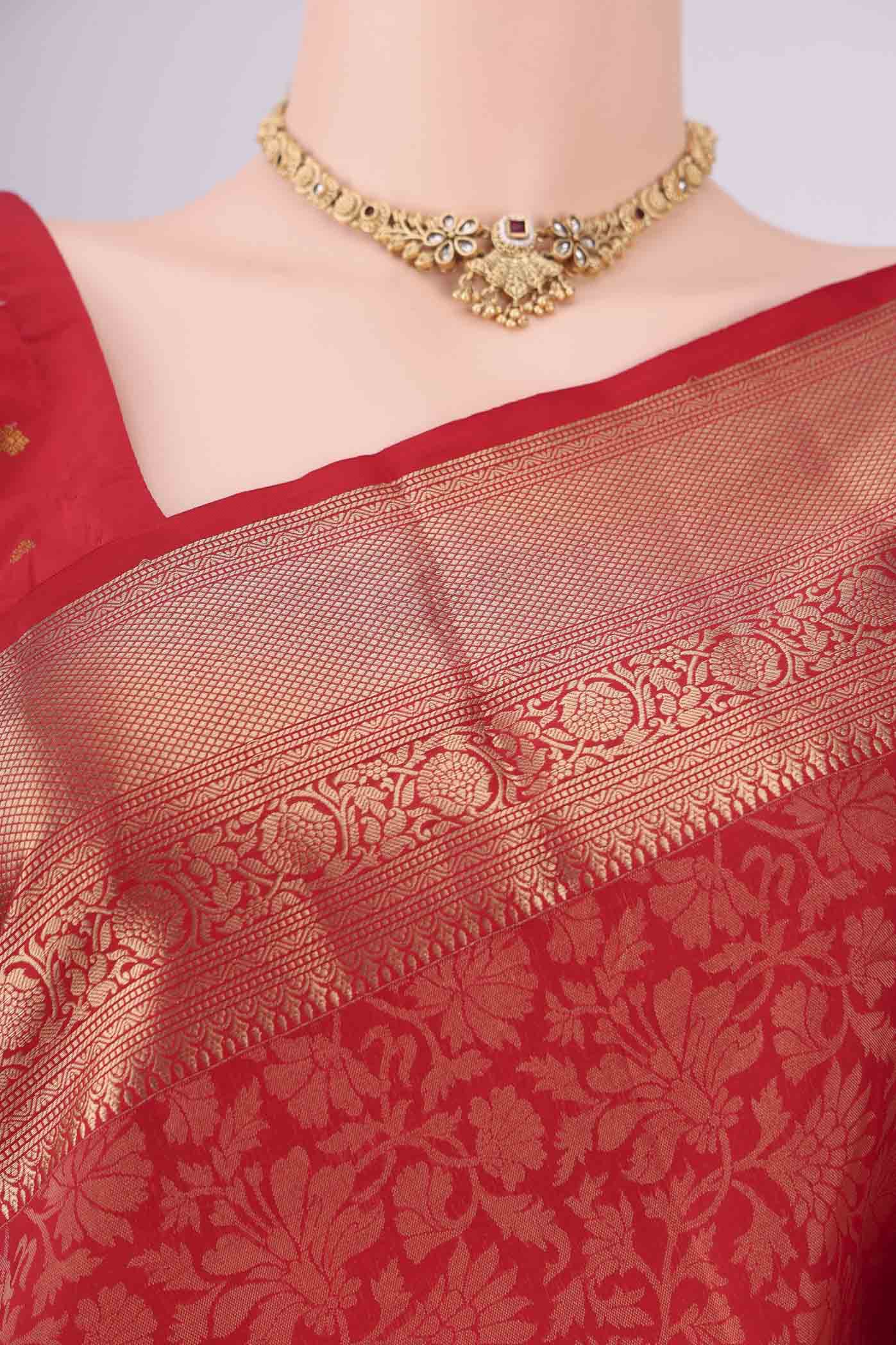 Border image of Red Soft Silk Saree with Zari Brocade on the body and Zari Border. 
