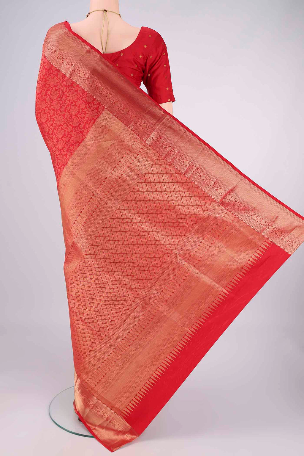 Flat view of Red Soft Silk Saree with Zari Brocade on the body and Zari Border. 