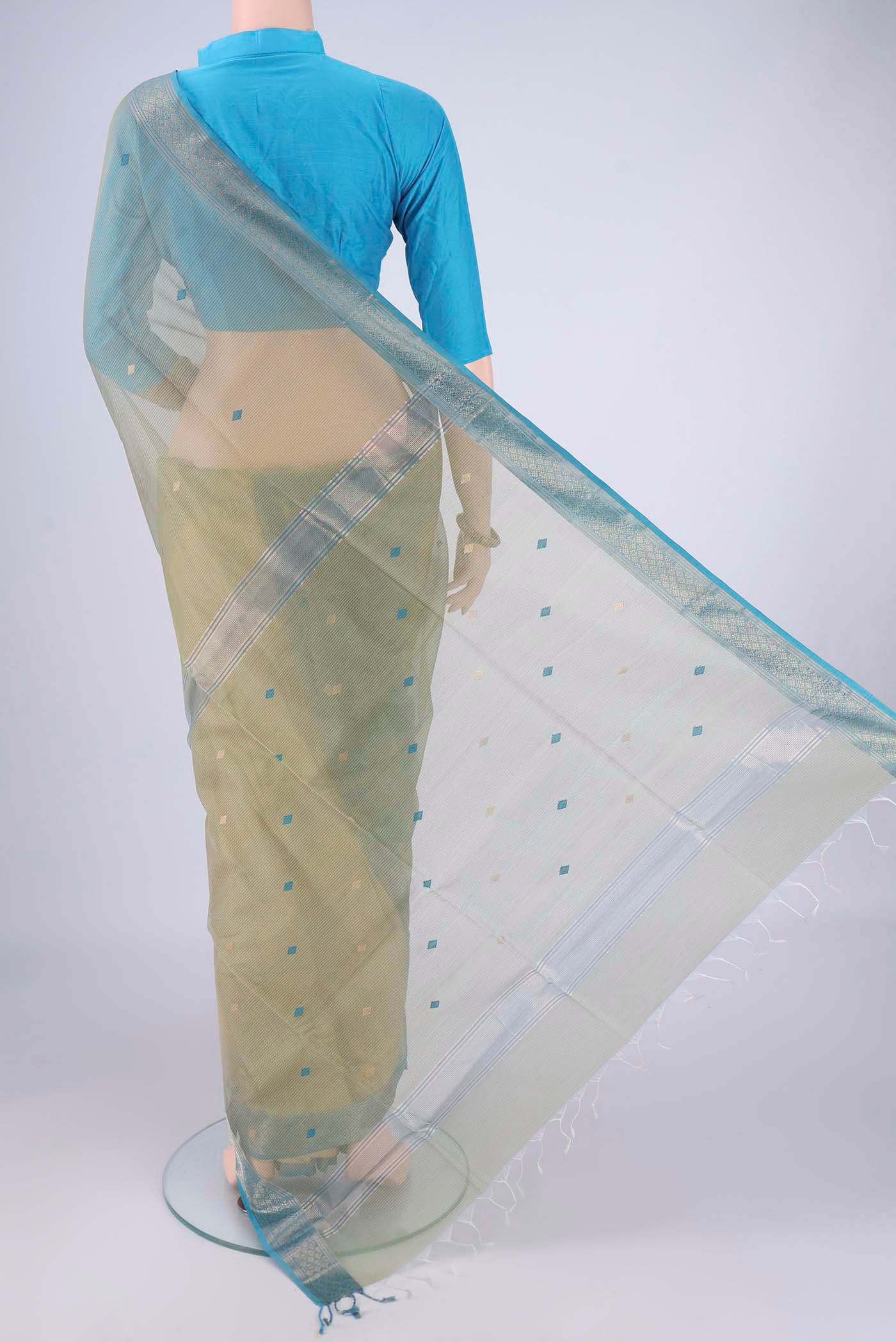 Flat view of Light Green Dual Tone Maheshwari Silk Cotton Saree with Stripes on the body and Zari Border. 