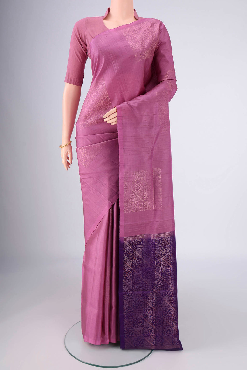 Lavender Dual Tone Soft Silk Saree with Zari Brocade on the body and Without Border.  displayed on a mannequin