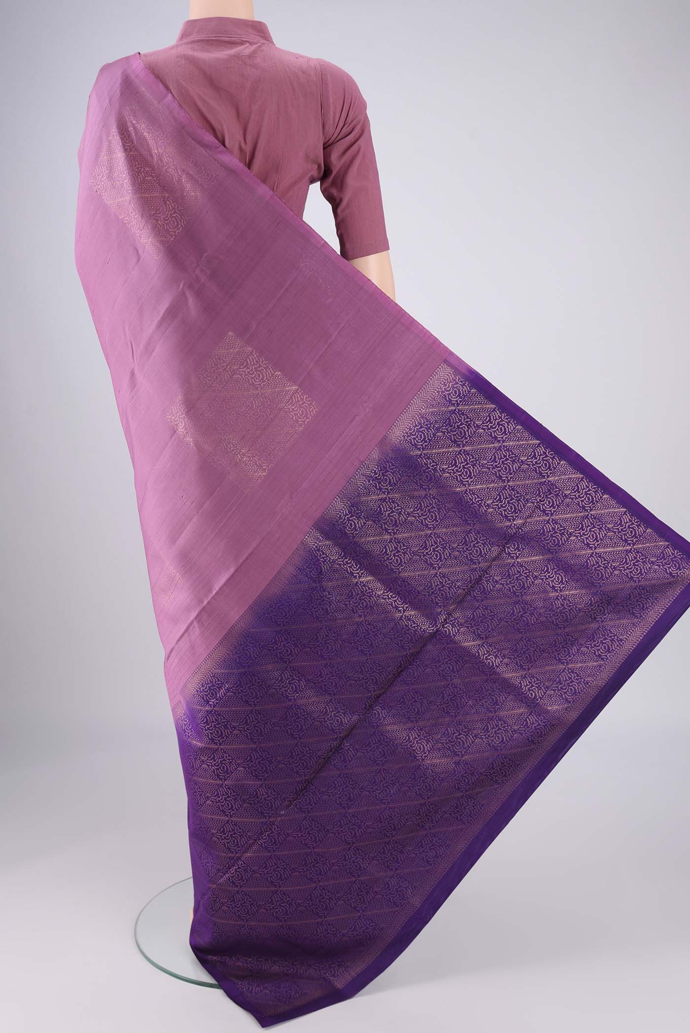 Flat view of Lavender Dual Tone Soft Silk Saree with Zari Brocade on the body and Without Border. 