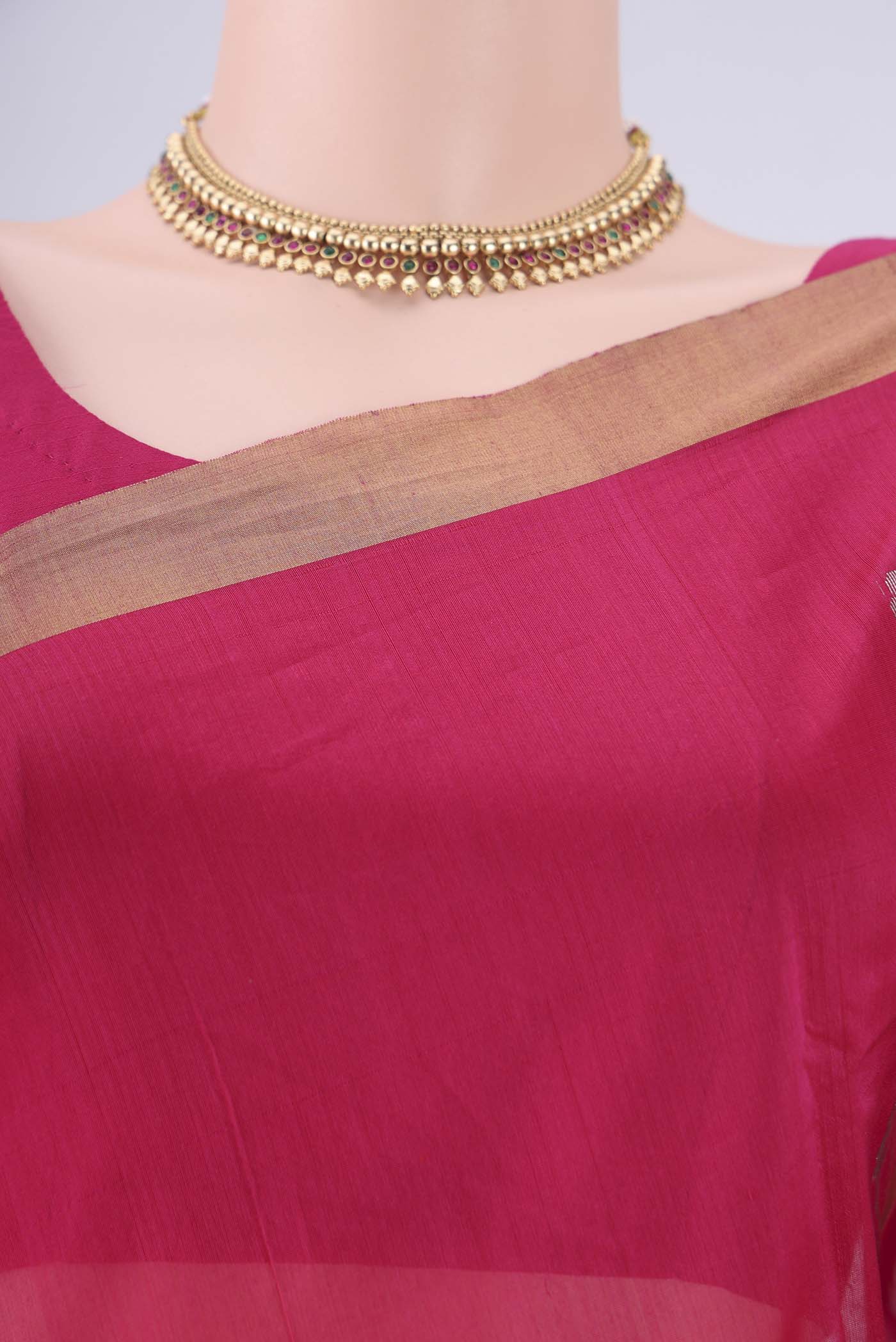 Border image of Rani Pink Chanderi Silk Saree with Zari Butta on the body and Zari Border. 