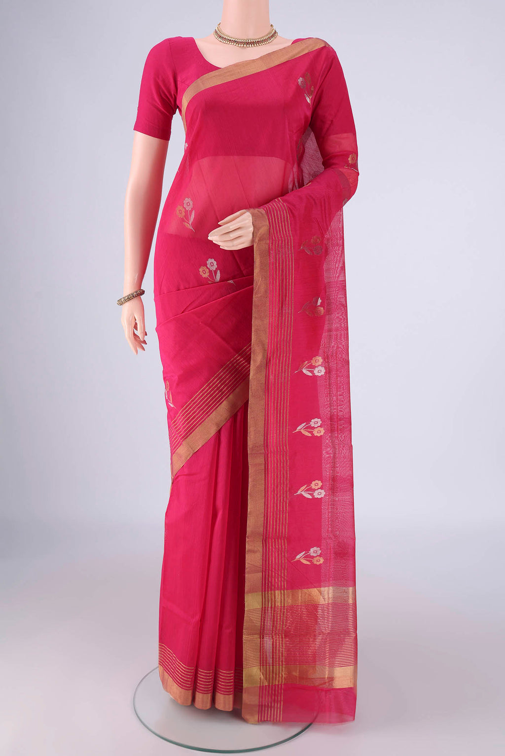 Rani Pink Chanderi Silk Saree with Zari Butta on the body and Zari Border.  displayed on a mannequin