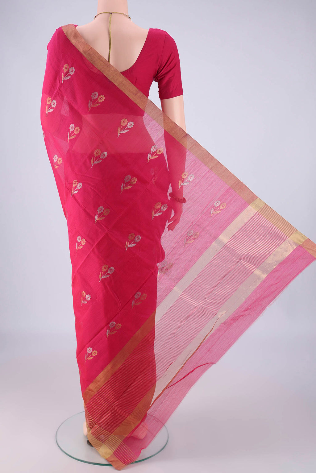 Flat view of Rani Pink Chanderi Silk Saree with Zari Butta on the body and Zari Border. 