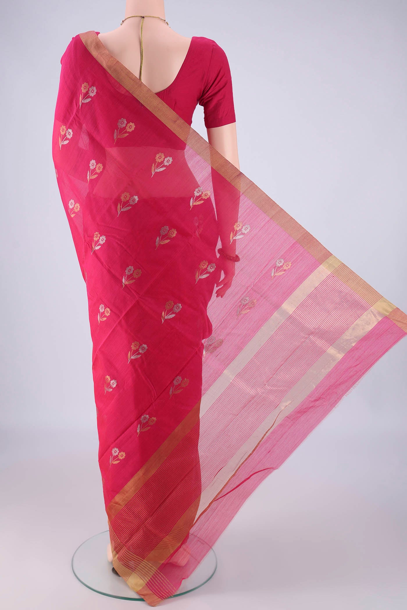Flat view of Rani Pink Chanderi Silk Saree with Zari Butta on the body and Zari Border. 