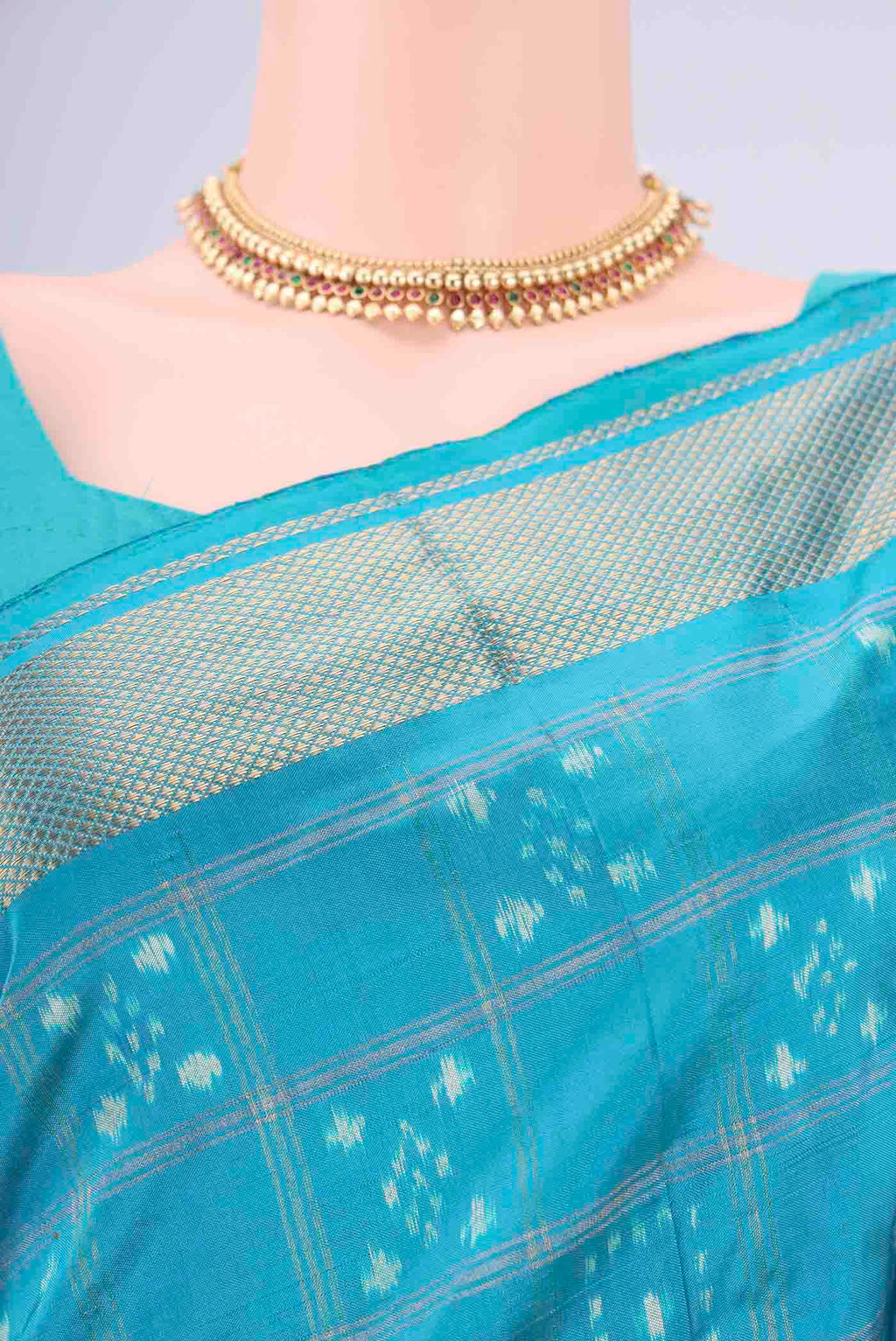 Border image of Turquoise Pochampally Silk Saree with Checked design on the body and Zari Border. 