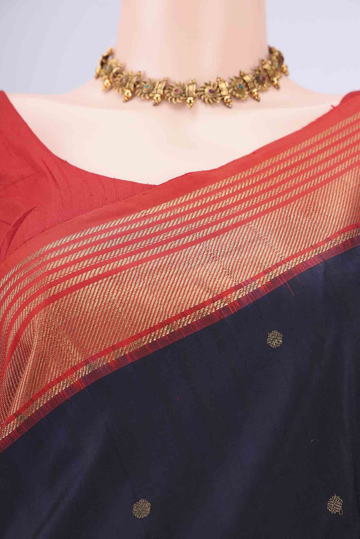 Border image of Navy Blue Pochampally Silk Saree with Zari Butta on the body and Zari Border. 