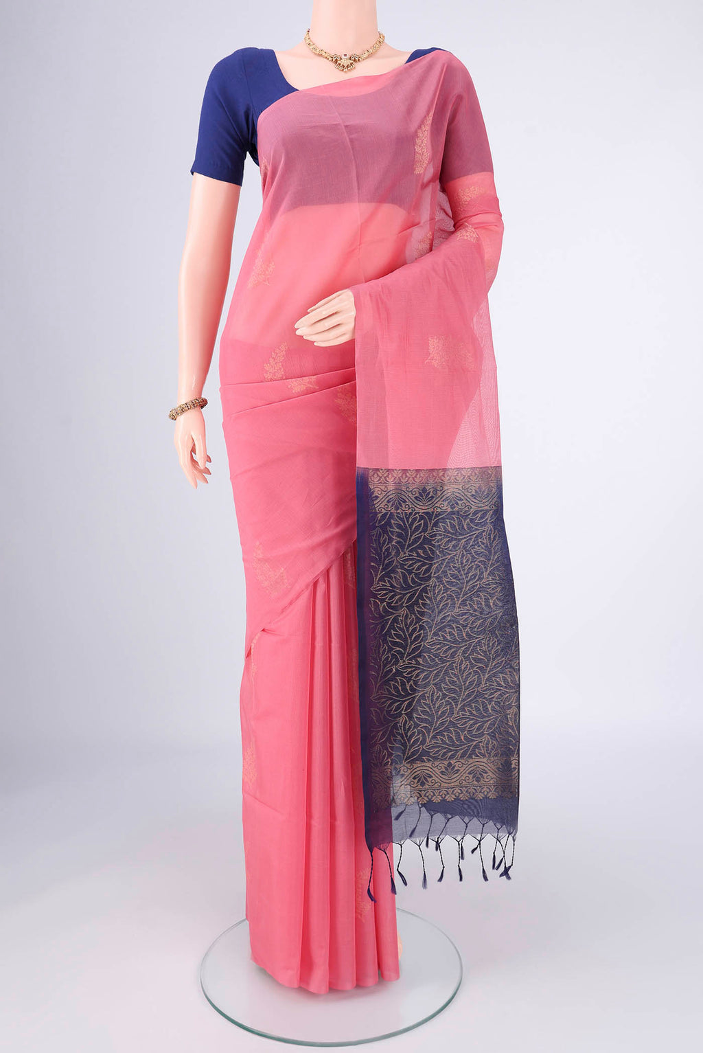 Pink Kora Cotton Saree with Zari Butta on the body and Plain Border.  displayed on a mannequin