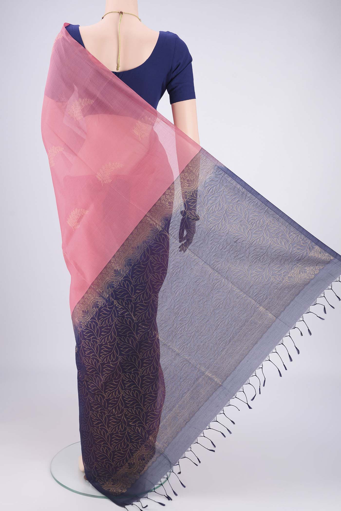 Flat view of Pink Kora Cotton Saree with Zari Butta on the body and Plain Border. 