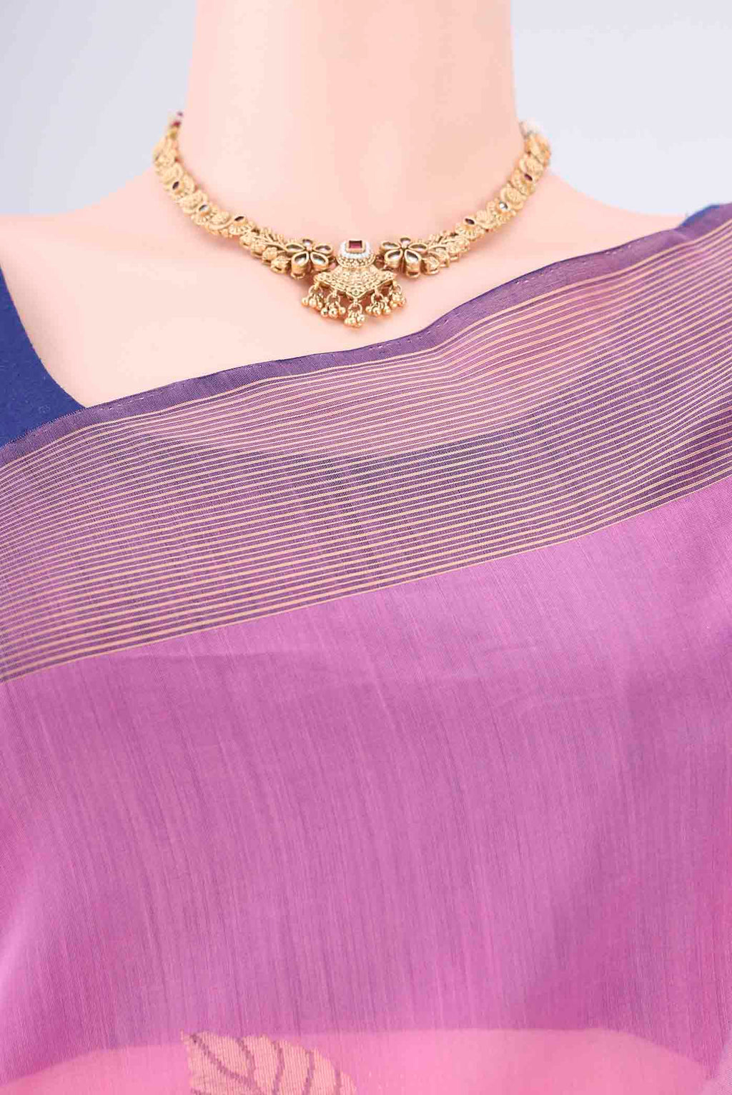 Border image of Pink Kora Cotton Saree with Zari Butta on the body and Plain Border. 
