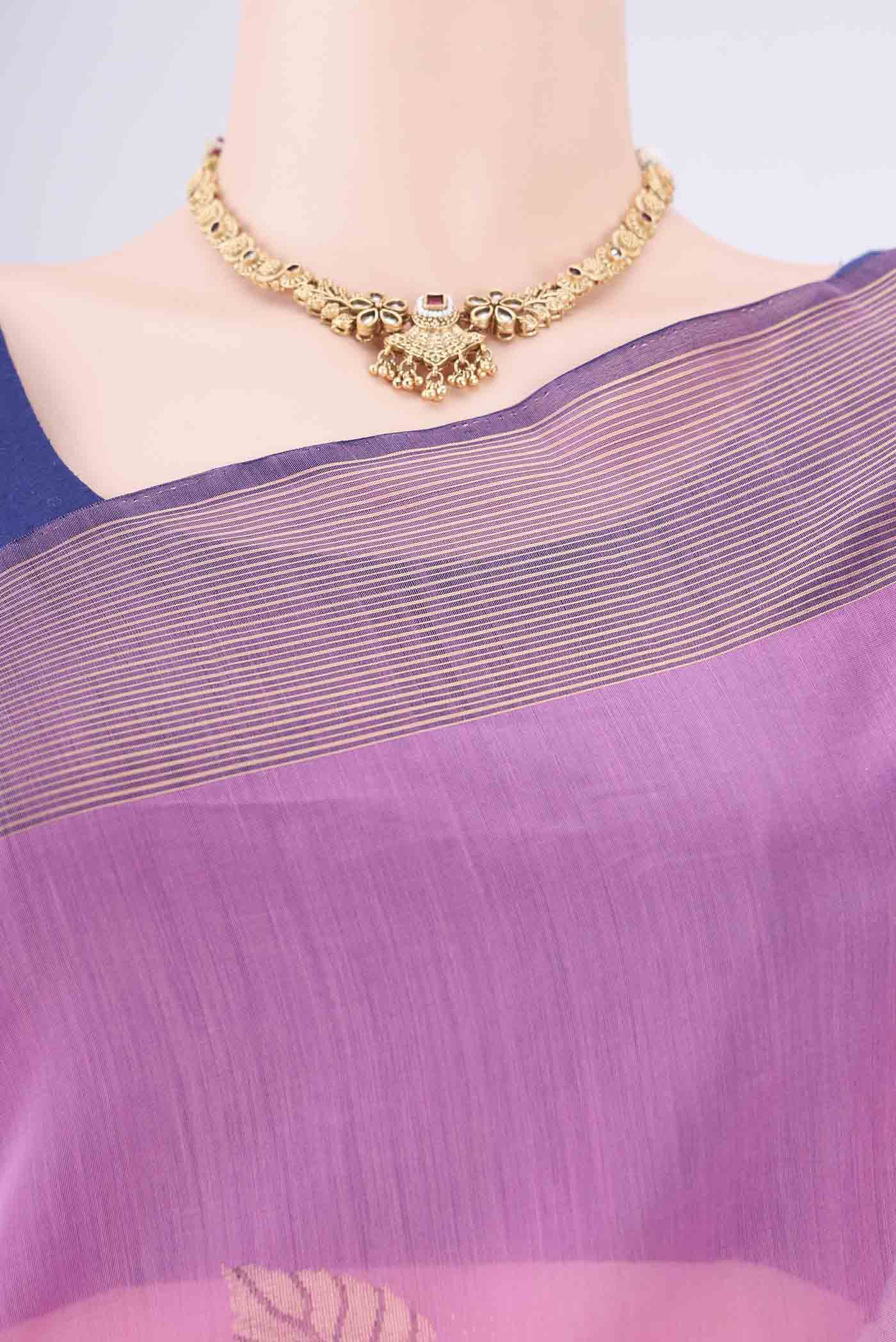Border image of Pink Kora Cotton Saree with Zari Butta on the body and Plain Border. 