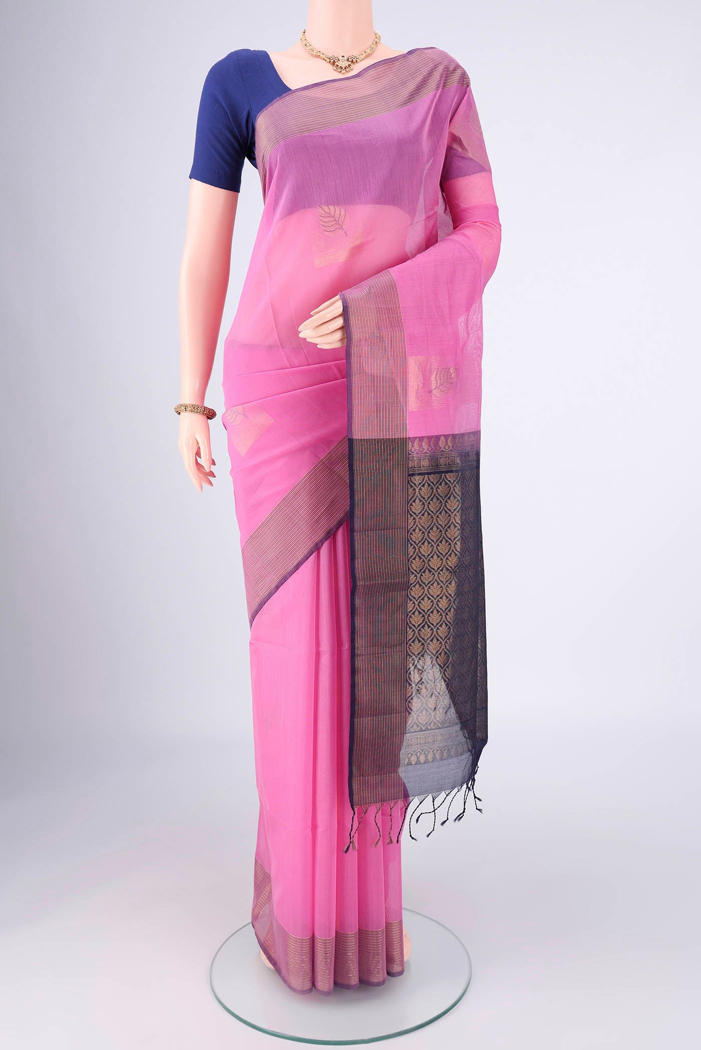 Pink Kora Cotton Saree with Zari Butta on the body and Plain Border.  displayed on a mannequin