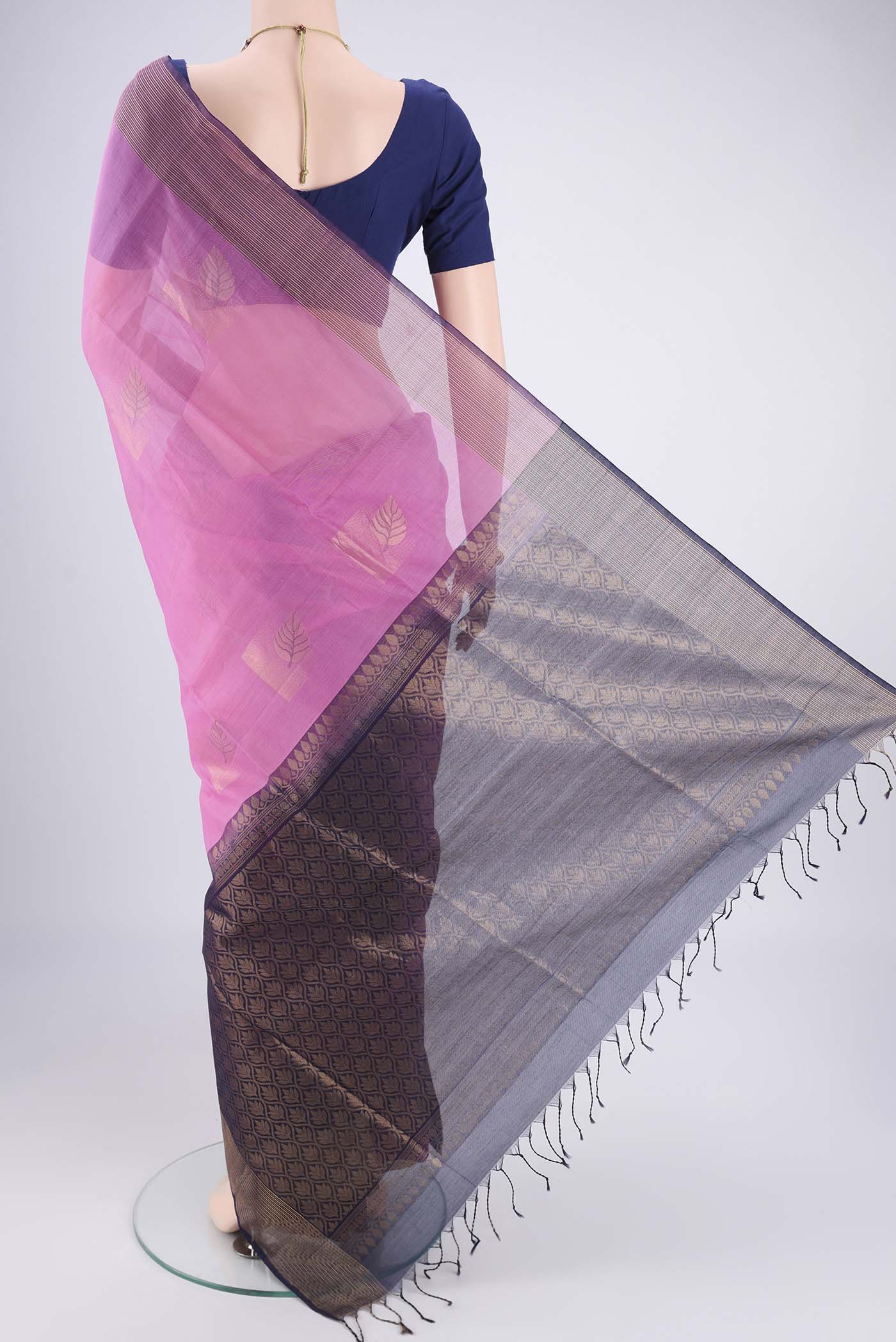 Flat view of Pink Kora Cotton Saree with Zari Butta on the body and Plain Border. 