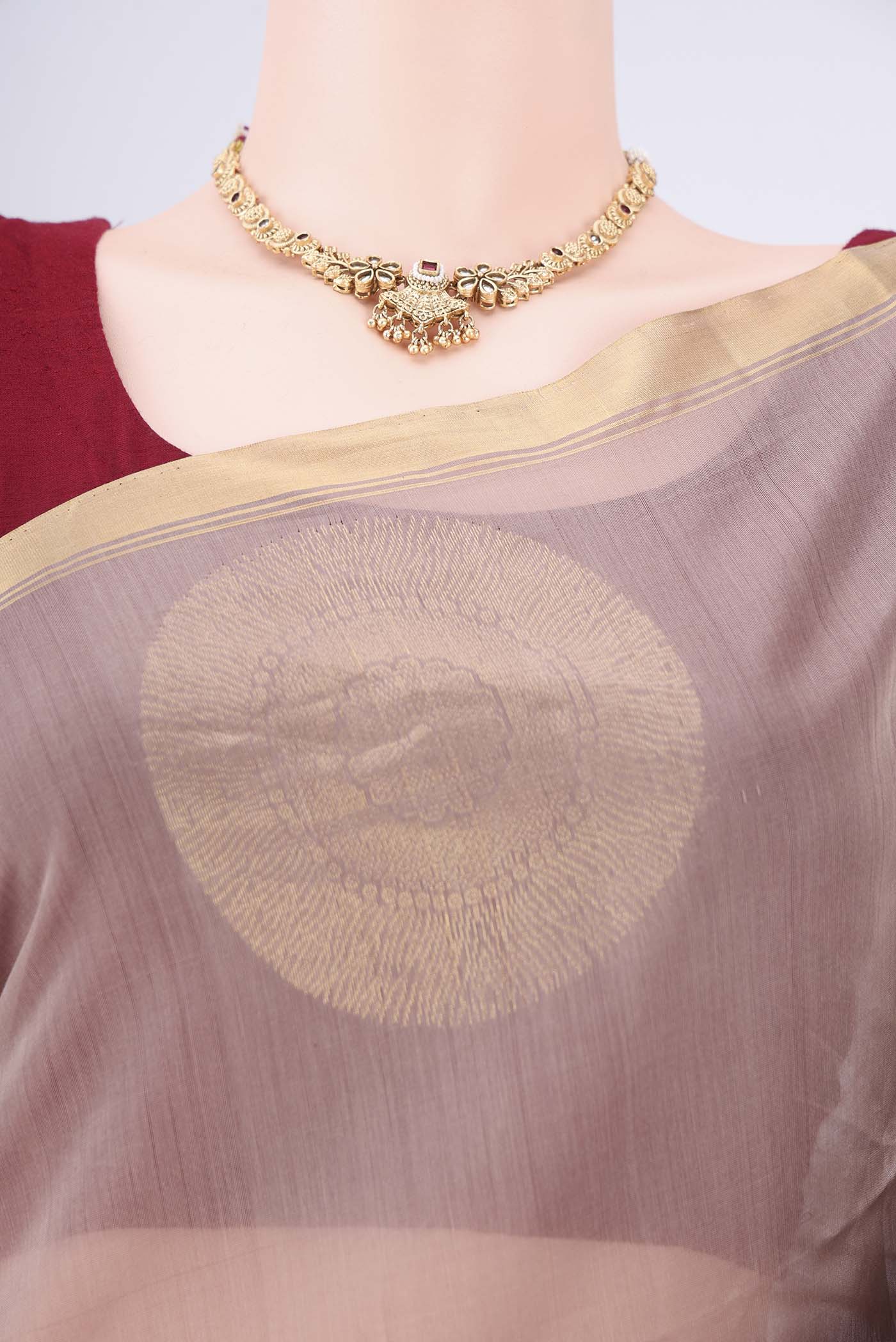 Border image of Dark Beige Kora Cotton Saree with Zari Butta on the body and Plain Border. 