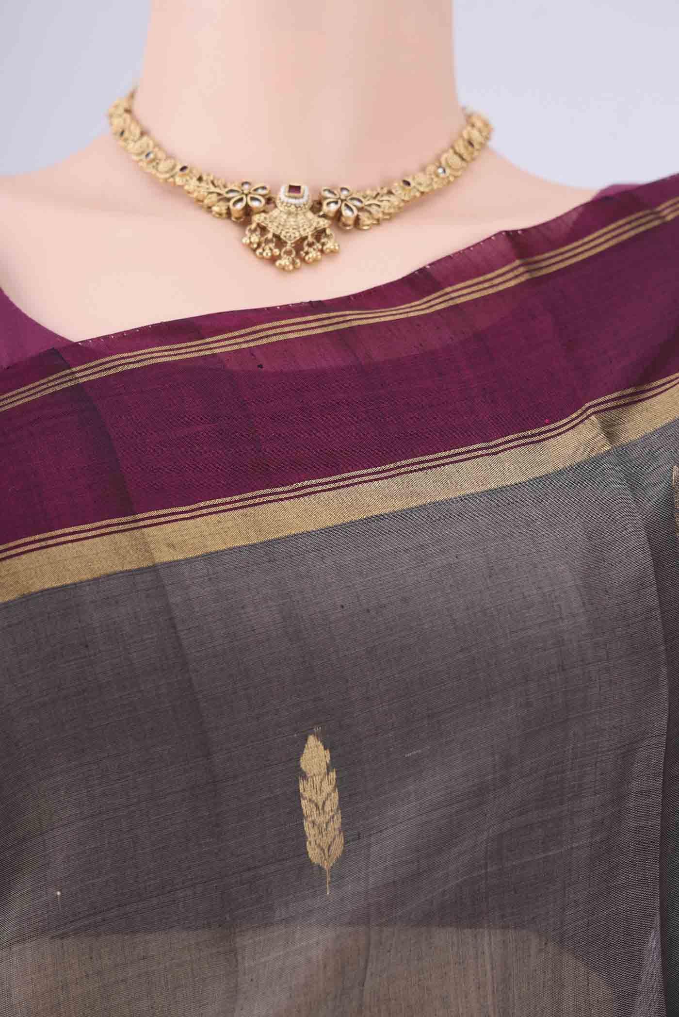 Border image of Grey Silk Cotton Saree with Zari Brocade on the body and Zari Border. 