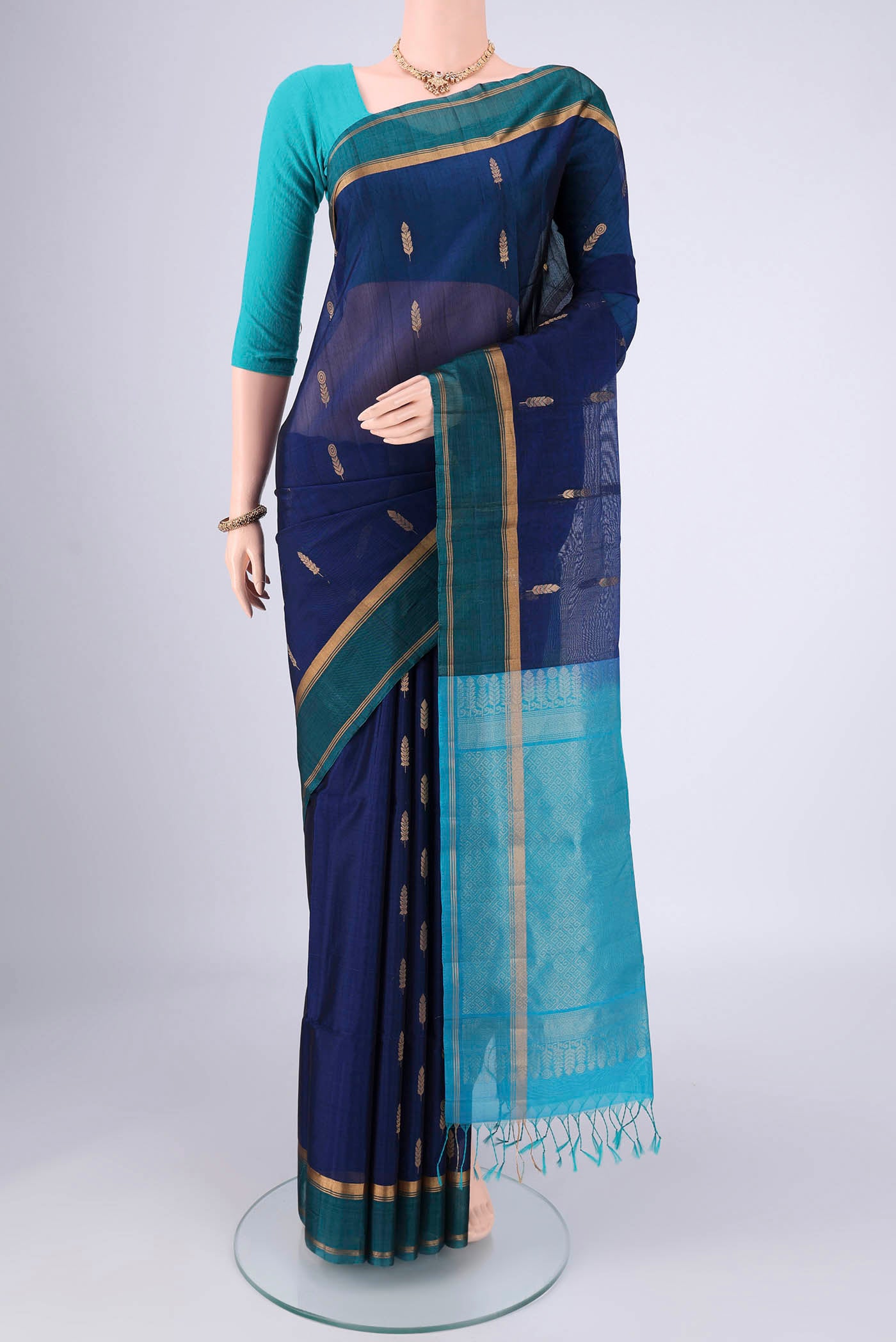 Royal Blue Silk Cotton Saree with Zari Brocade on the body and Zari Border.  displayed on a mannequin