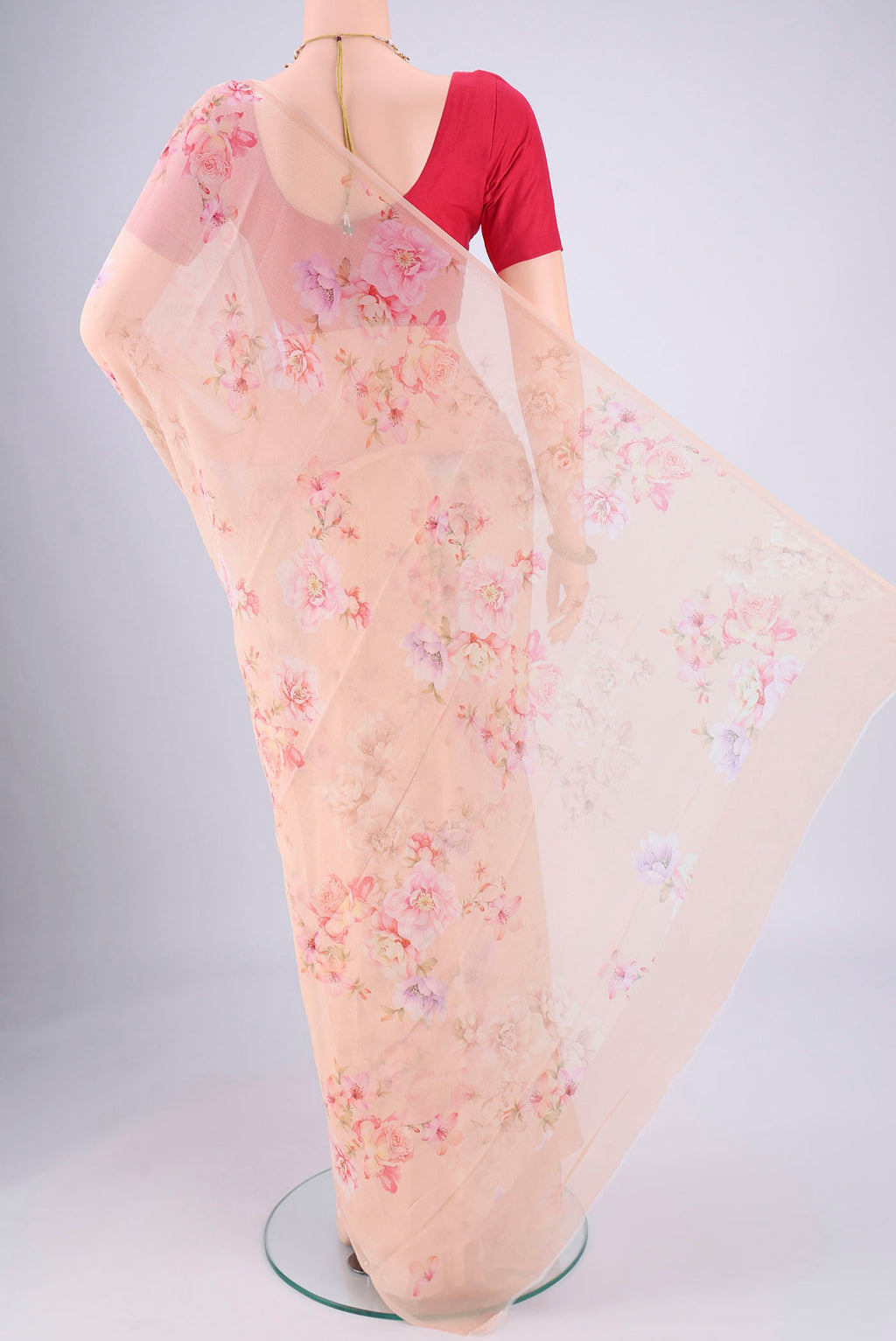 Flat view of Peach Mysore Chiffon Saree with Floral Print on the body and Without Border. 