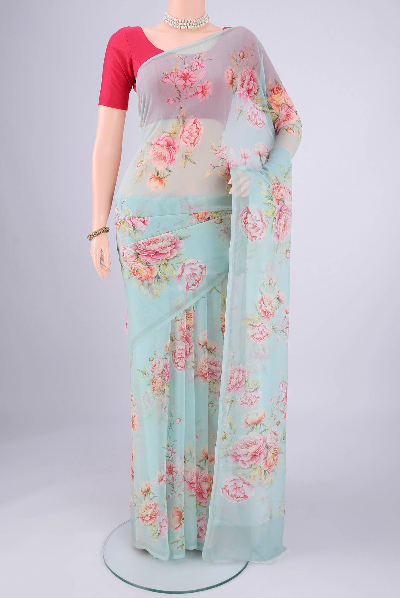 Mint Green Mysore Chiffon Saree with Floral Print on the body and Without Border.  displayed on a mannequin