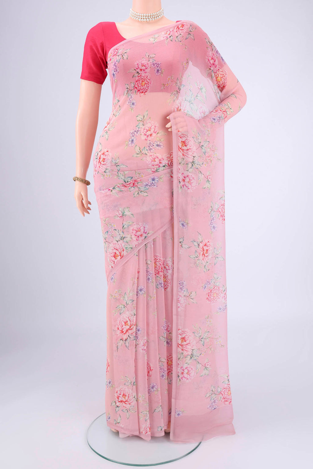 Rose pink Mysore Chiffon Saree with Floral Print on the body and Plain Border.  displayed on a mannequin