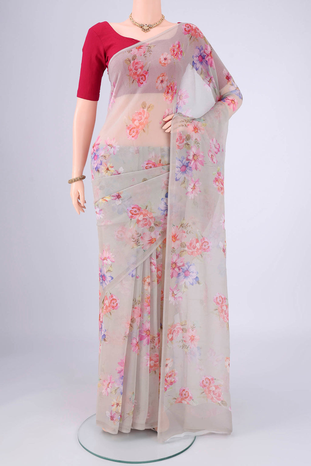 Grey Mysore Chiffon Saree with Floral Print on the body and Plain Border.  displayed on a mannequin
