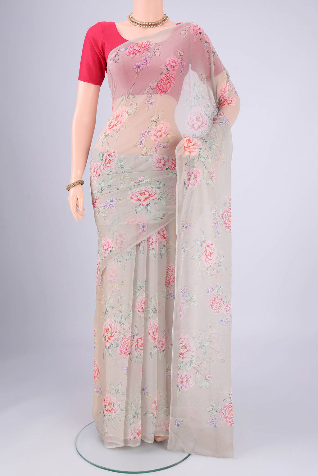 Sage Green Mysore Chiffon Saree with Floral Print on the body and Without Border.  displayed on a mannequin