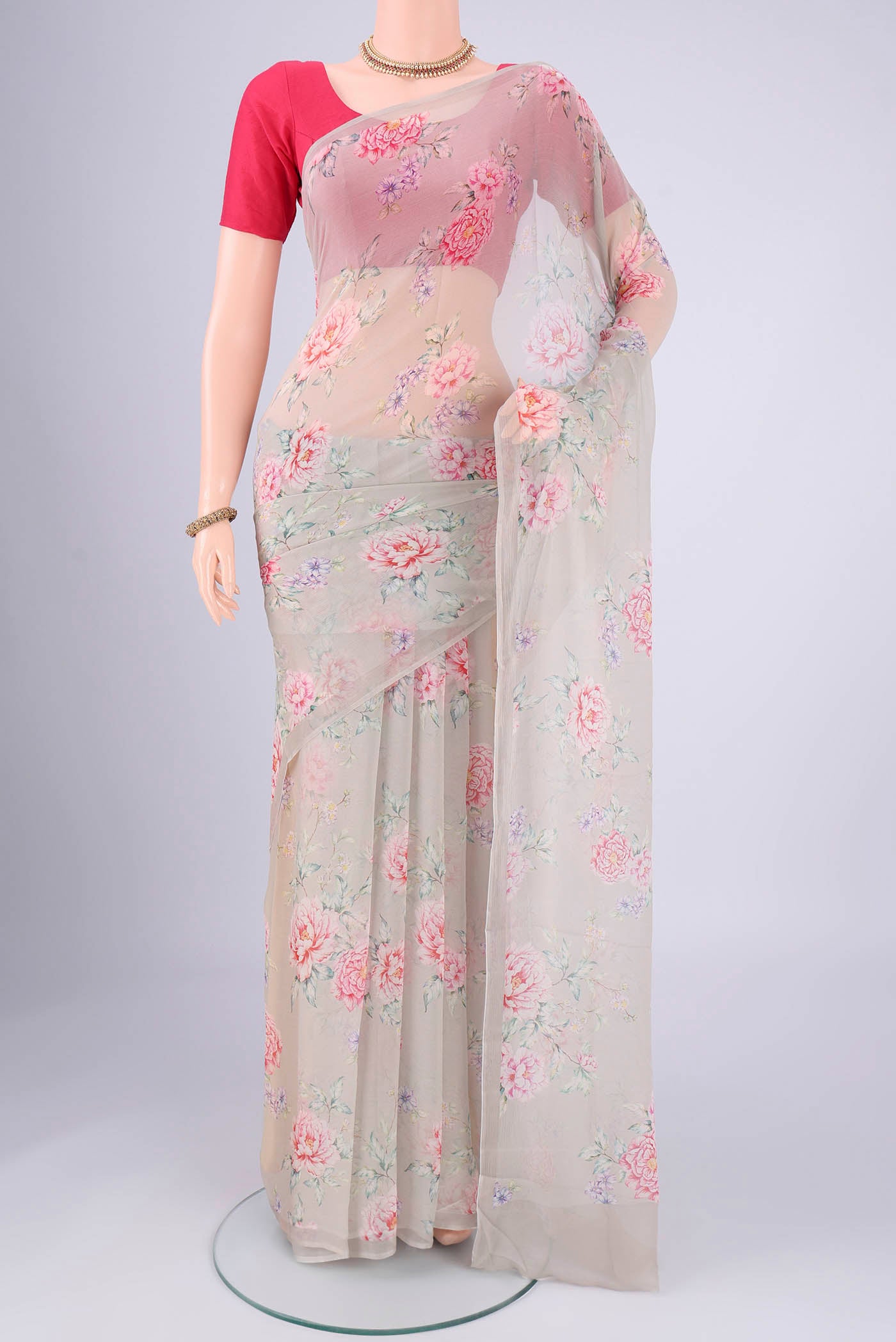 Sage Green Mysore Chiffon Saree with Floral Print on the body and Without Border.  displayed on a mannequin