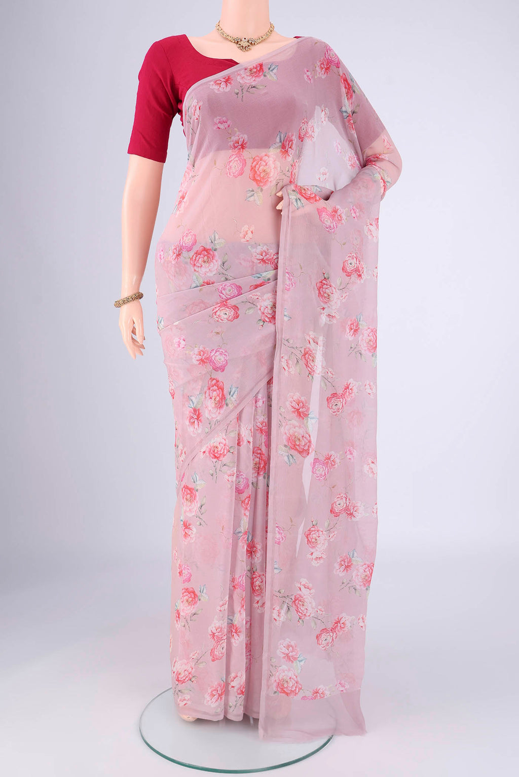 Mauve Mysore Chiffon Saree with Floral Print on the body and Plain Border.  displayed on a mannequin