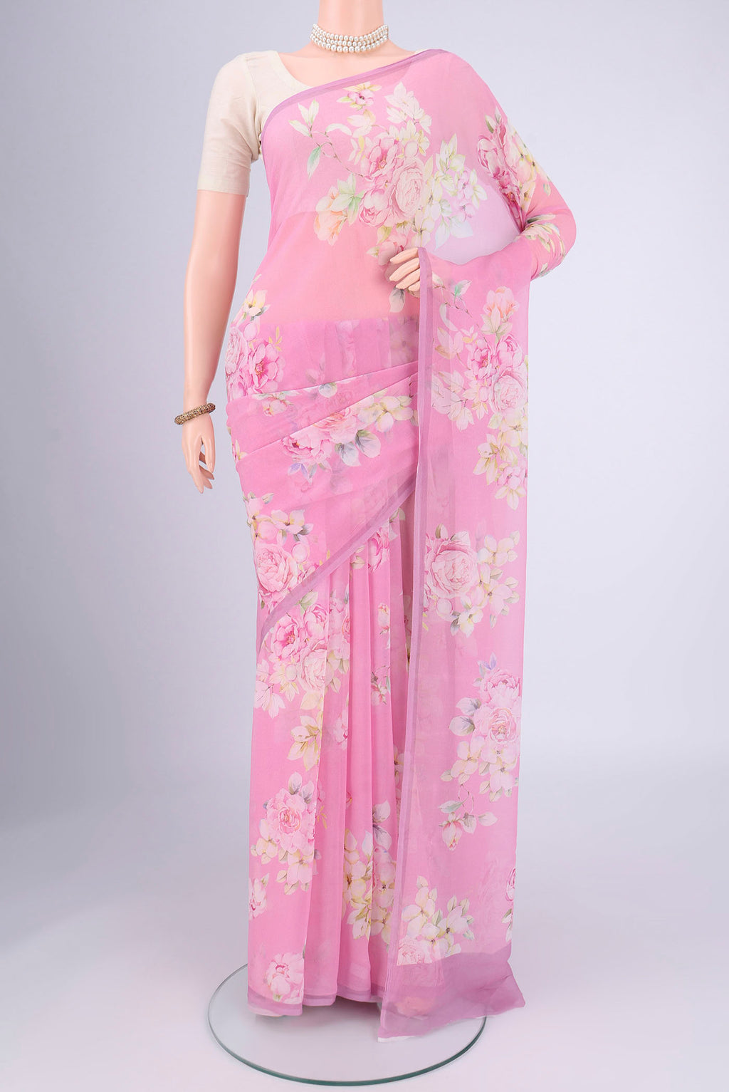 Rose pink Mysore Chiffon Saree with Floral Print on the body and Without Border.  displayed on a mannequin