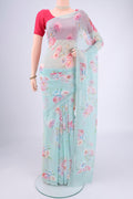 Sky Blue Mysore Chiffon Saree with Floral Print on the body and Plain Border.  displayed on a mannequin