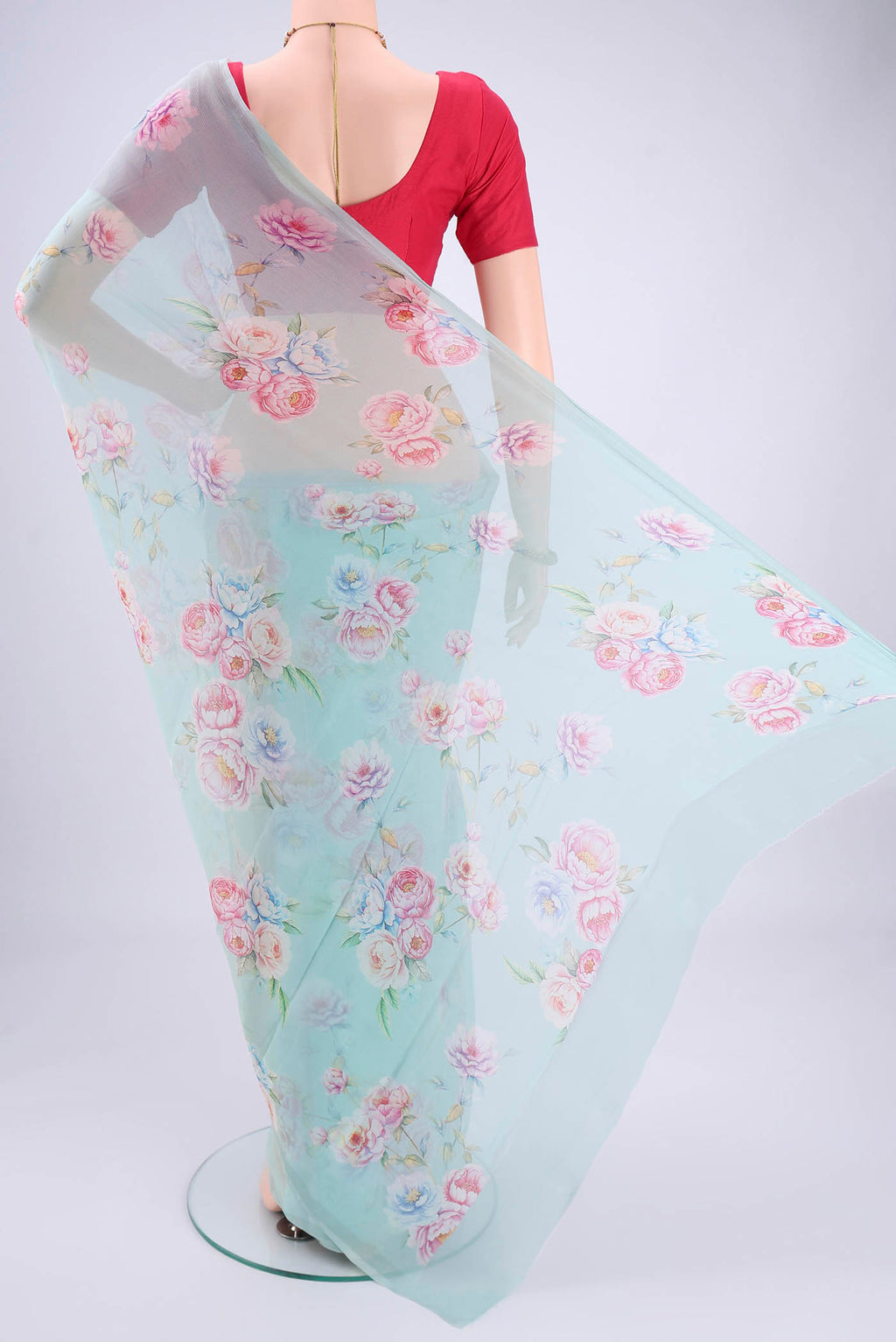 Flat view of Sky Blue Mysore Chiffon Saree with Floral Print on the body and Plain Border. 