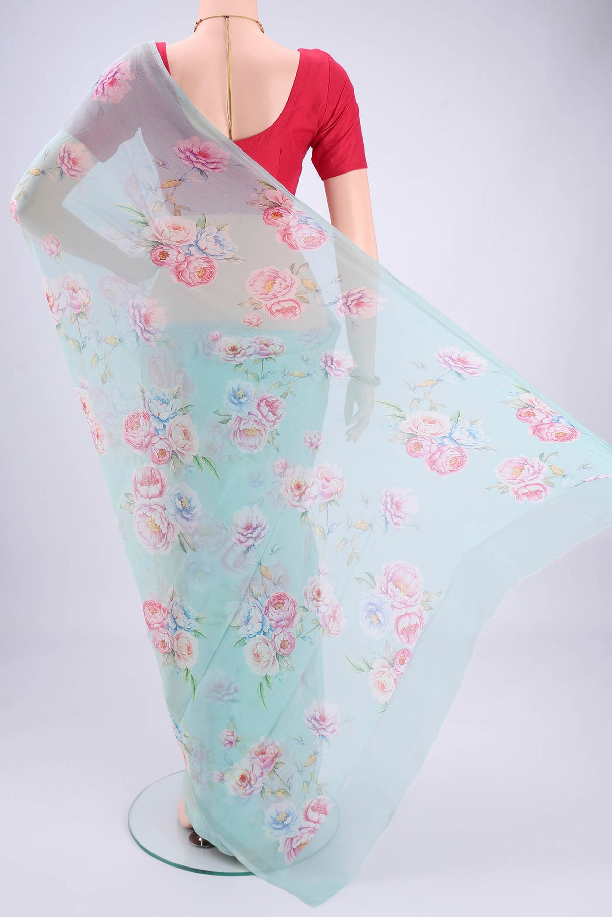 Flat view of Sky Blue Mysore Chiffon Saree with Floral Print on the body and Plain Border. 