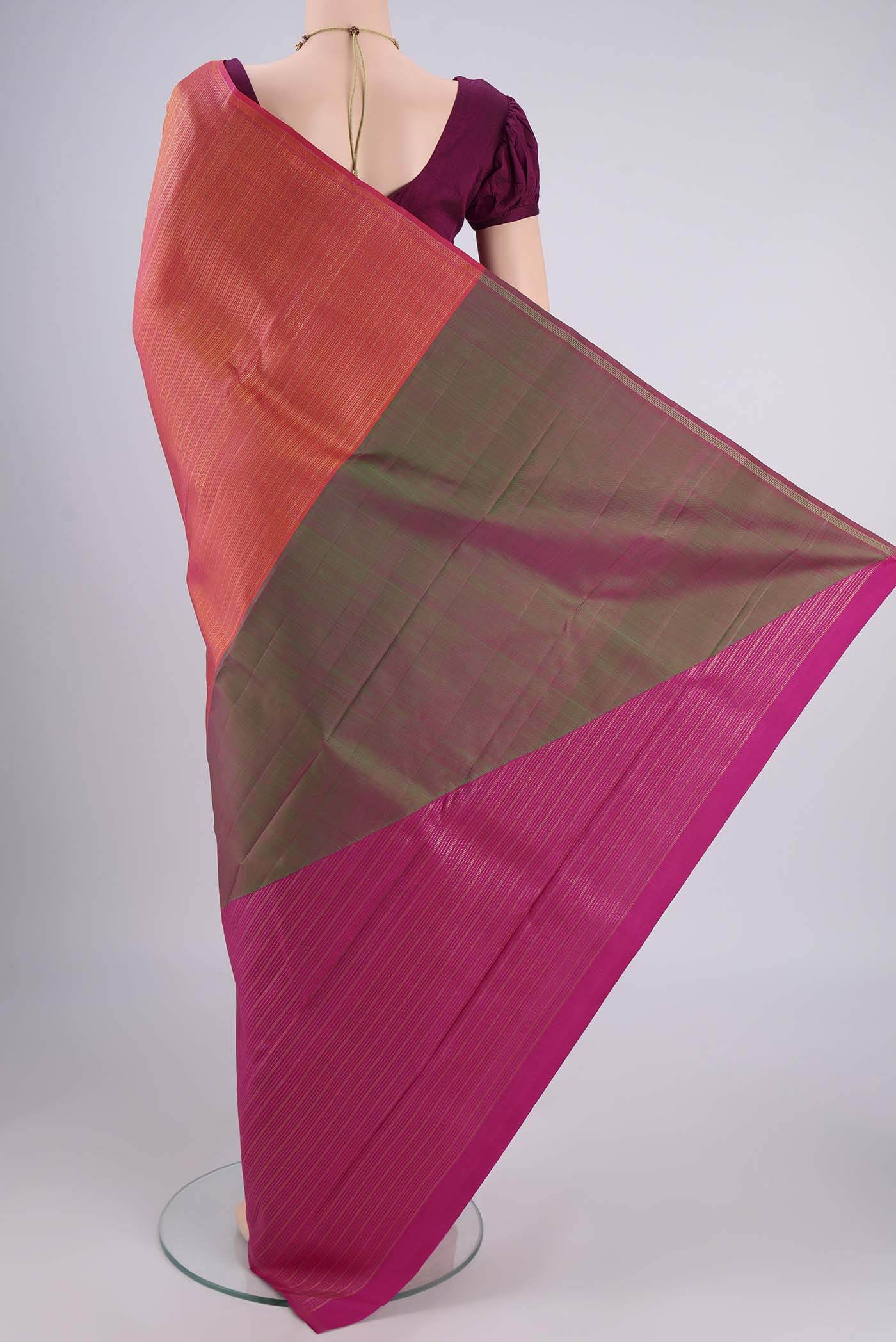 Flat view of Pure Silk Pure Zari Coral Dual Tone Kanjivaram Saree with Zari Brocade on the body and Without Border. 
