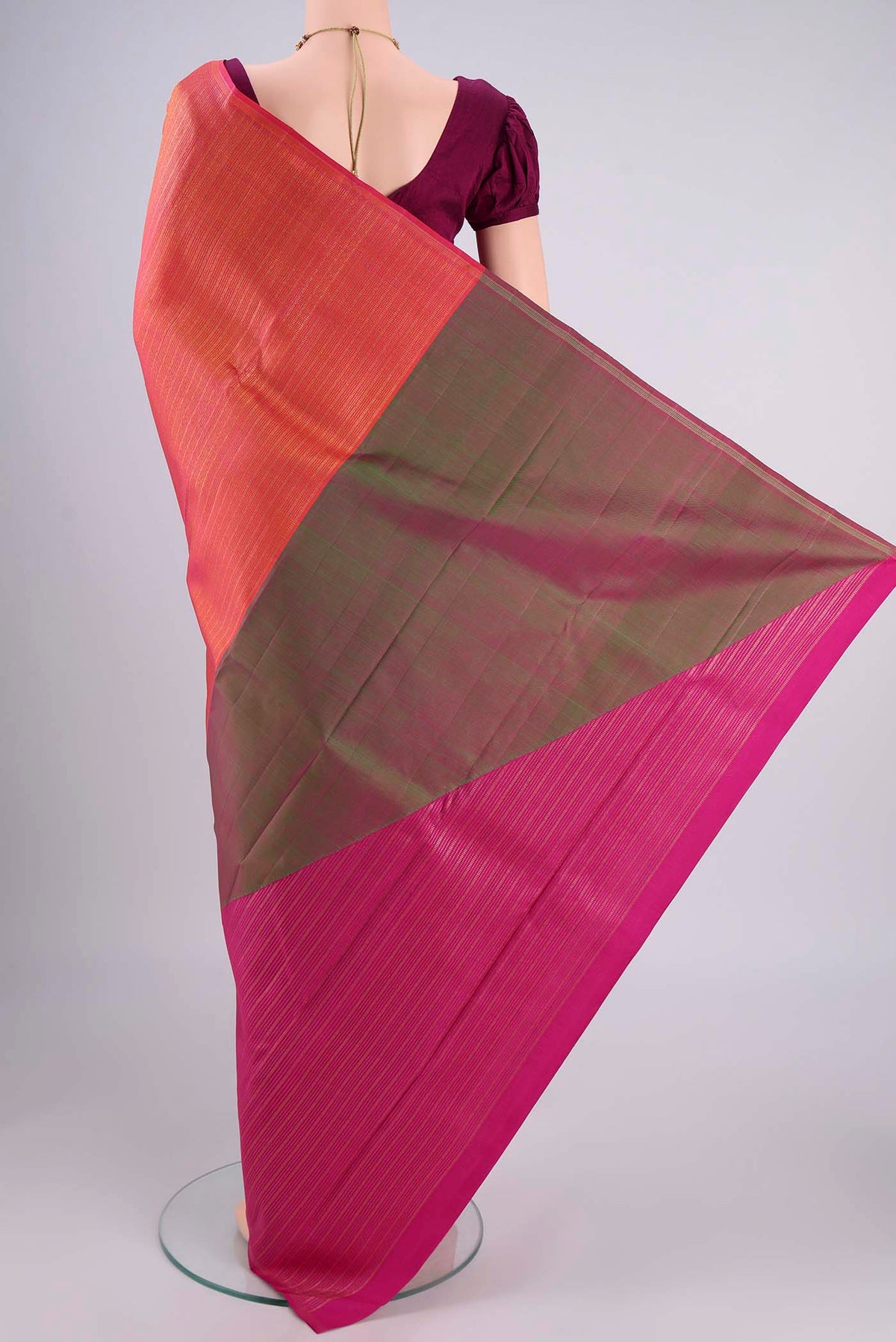 Flat view of Pure Silk Pure Zari Coral Dual Tone Kanjivaram Saree with Zari Brocade on the body and Without Border. 