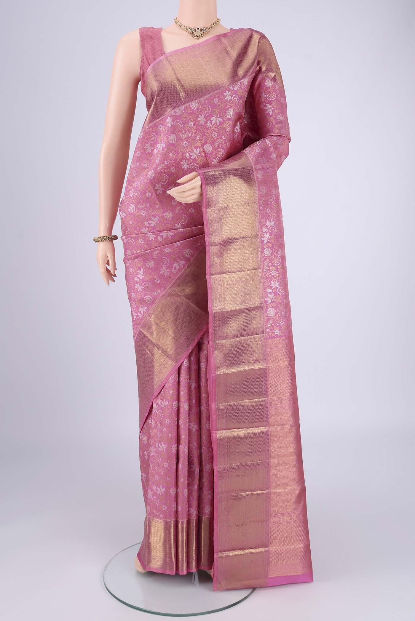 Pink Dual Tone Kanjivaram Silk Saree with Zari Brocade on the body and Zari Border.  displayed on a mannequin