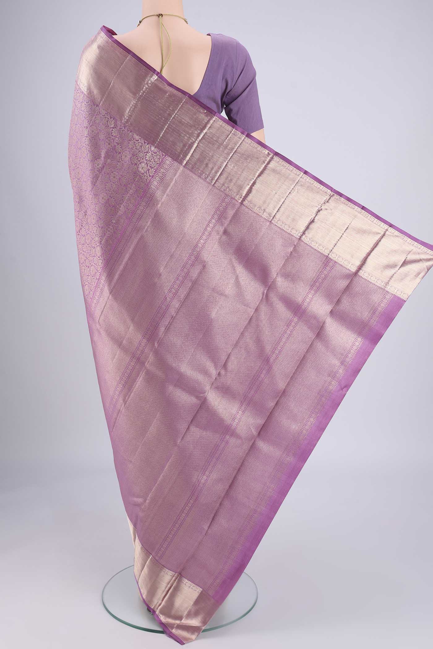 Flat view of Lilac Dual Tone Kanchipuram Silk Saree with Zari Brocade on the body and Zari Border. 