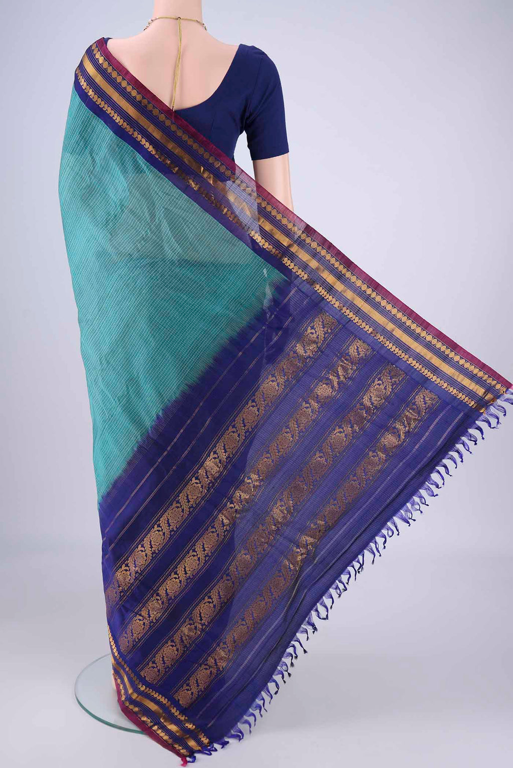 Flat view of Sea Green Gadwal Silk Cotton Saree with Checked design on the body and Silk Border. 