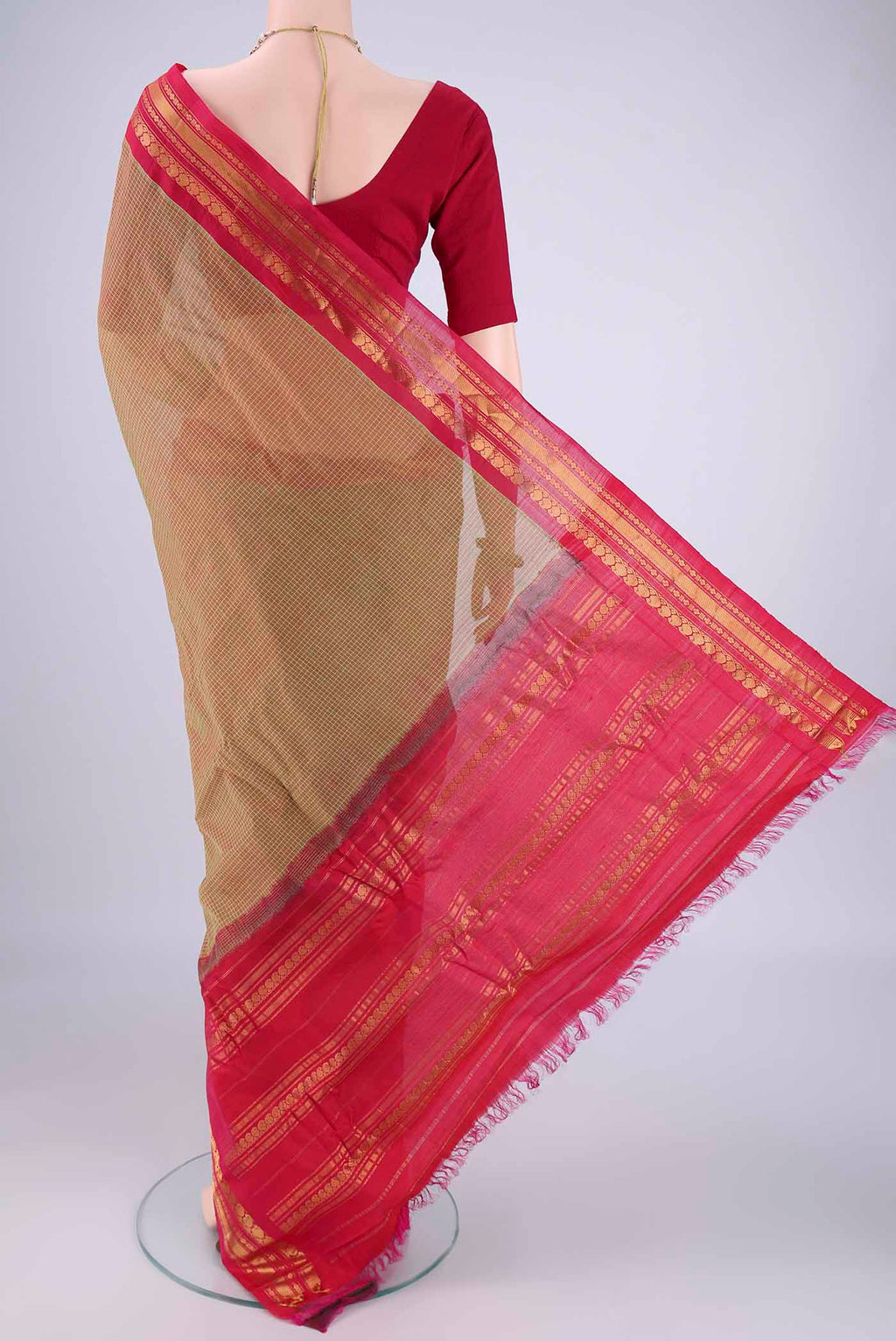 Flat view of Mehandi Green Gadwal Silk Cotton Saree with Checked design on the body and Silk Border. 