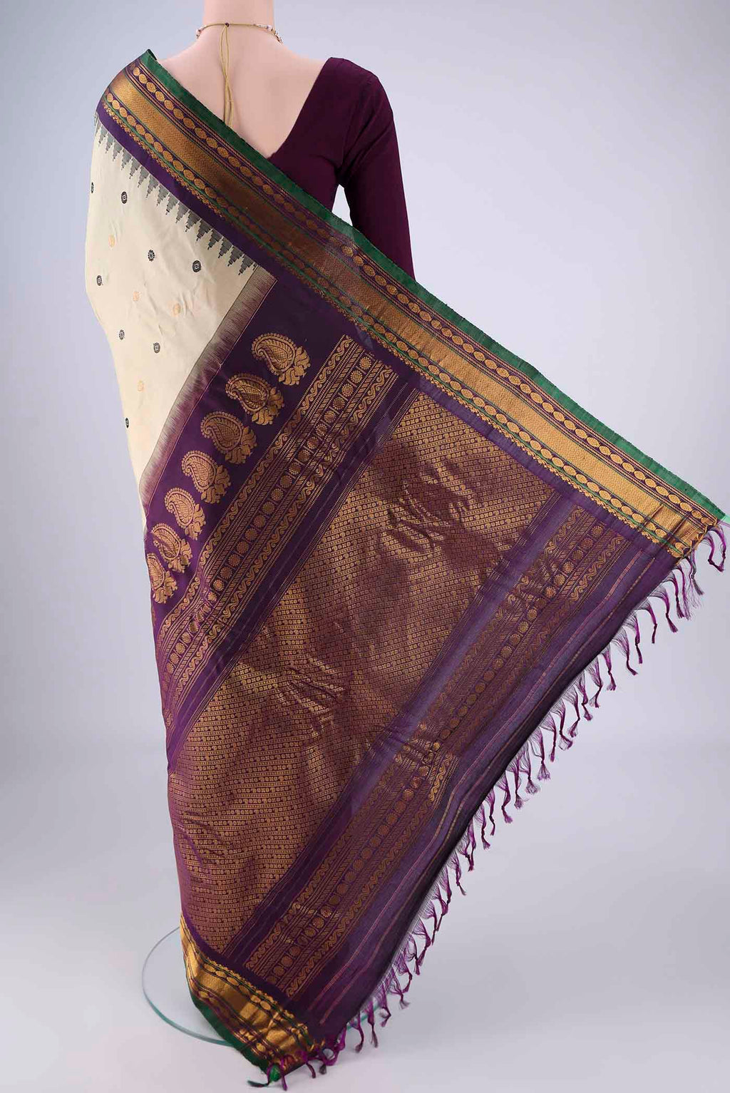 Flat view of Beige Gadwal Silk Saree with Zari Butta on the body and Zari Border. 