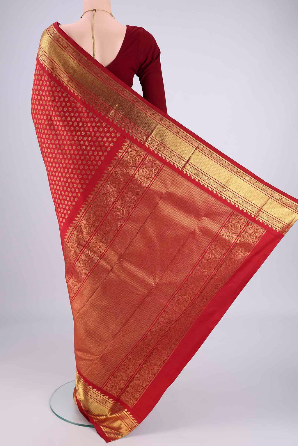 Flat view of Pure Silk Pure Zari Red Kanjivaram Saree with Zari Brocade on the body and Zari Border. 