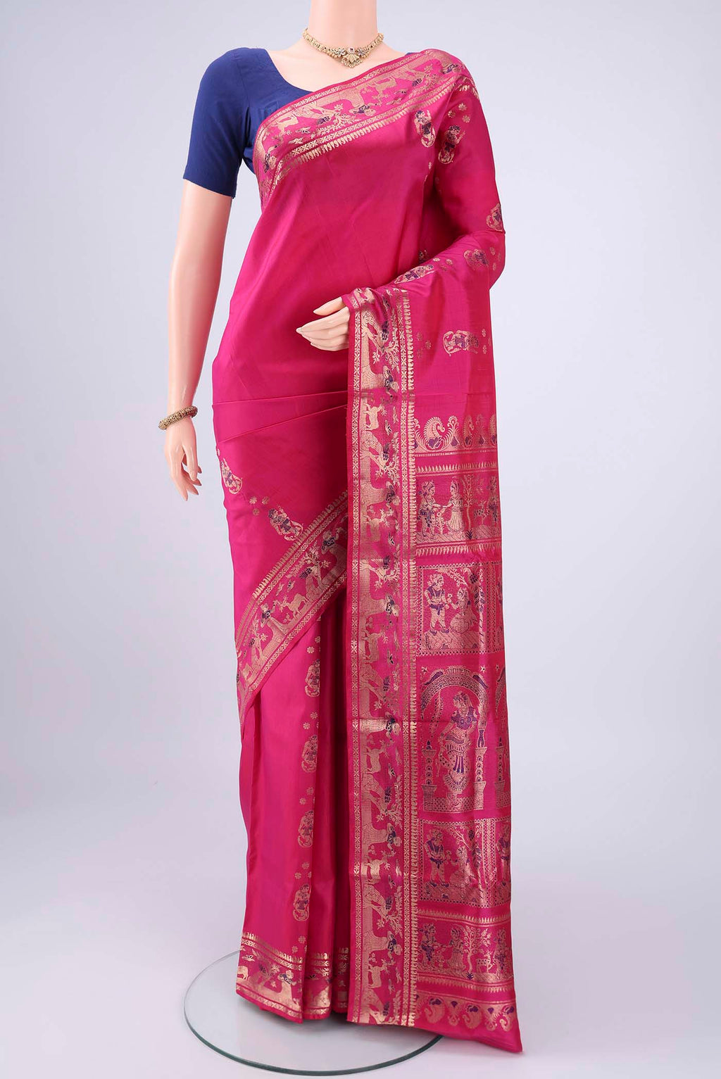 Rani Pink Baluchari Silk Saree with Zari And Thread Butta on the body and Zari And Thread Border.  displayed on a mannequin