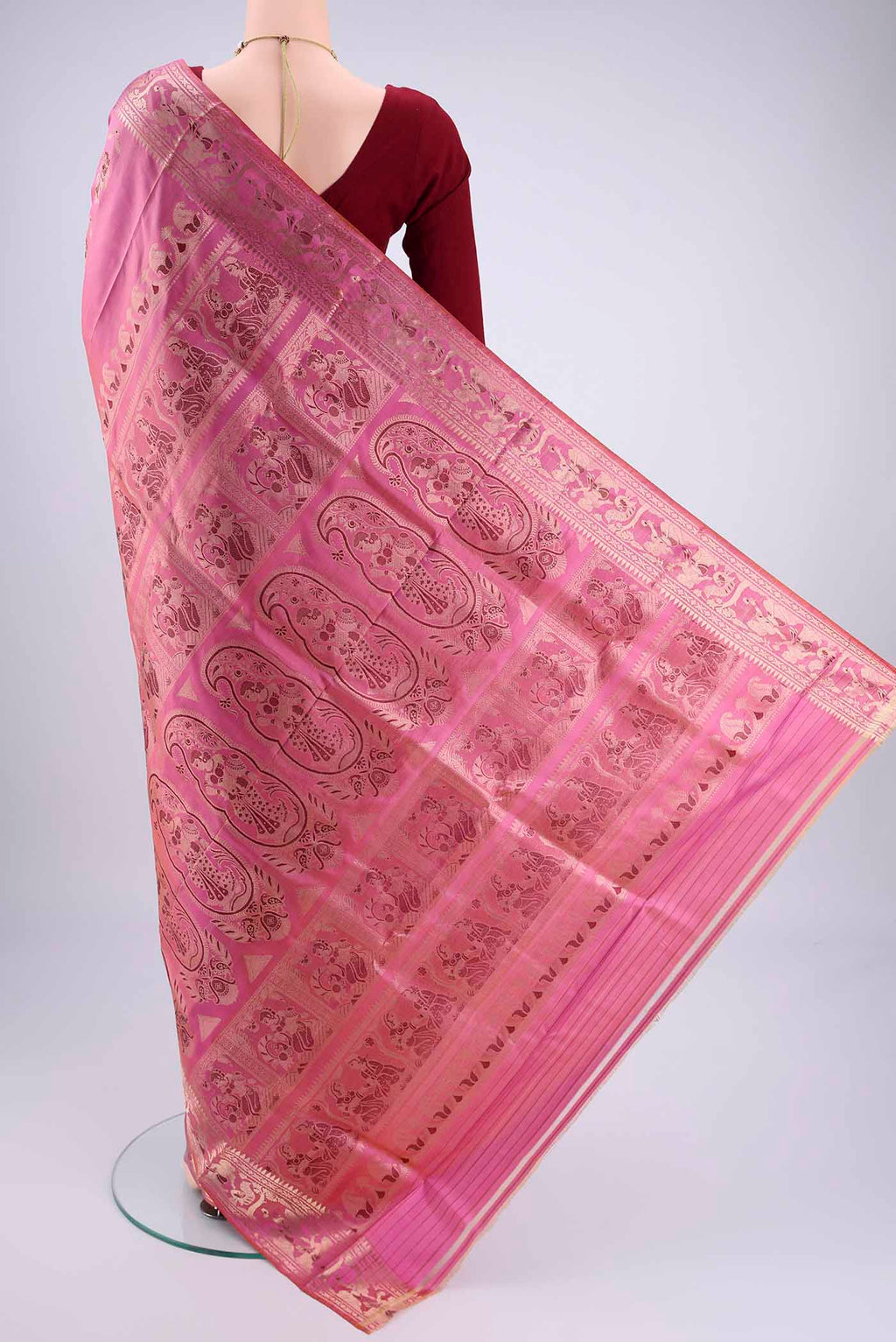 Flat view of Pink Baluchari Silk Saree with Zari And Thread Butta on the body and Zari And Thread Border. 