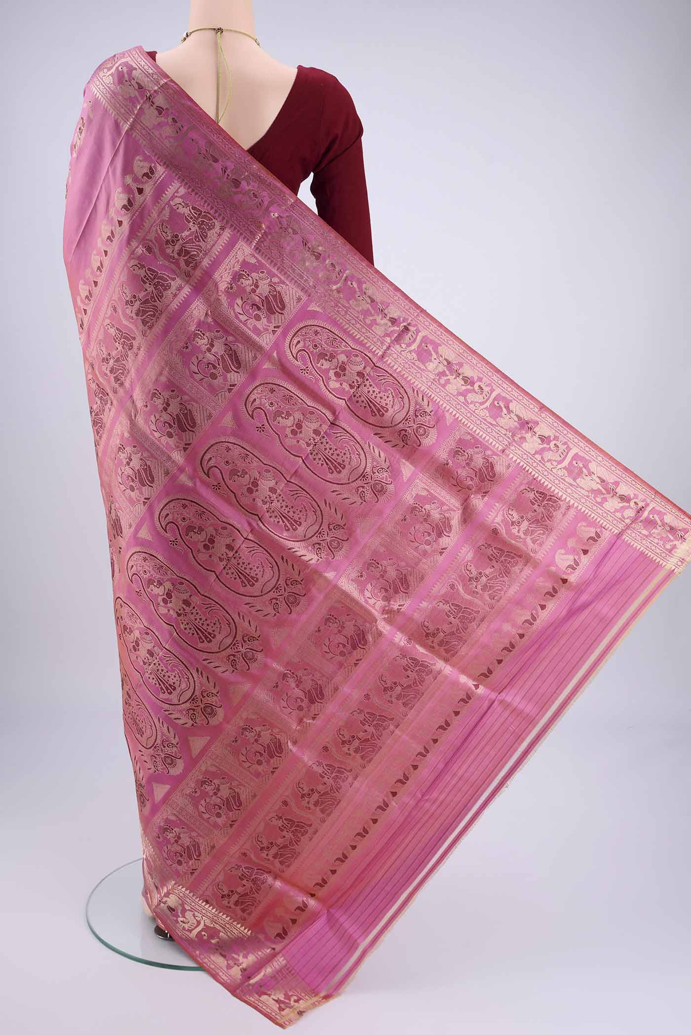 Flat view of Pink Baluchari Silk Saree with Zari And Thread Butta on the body and Zari And Thread Border. 
