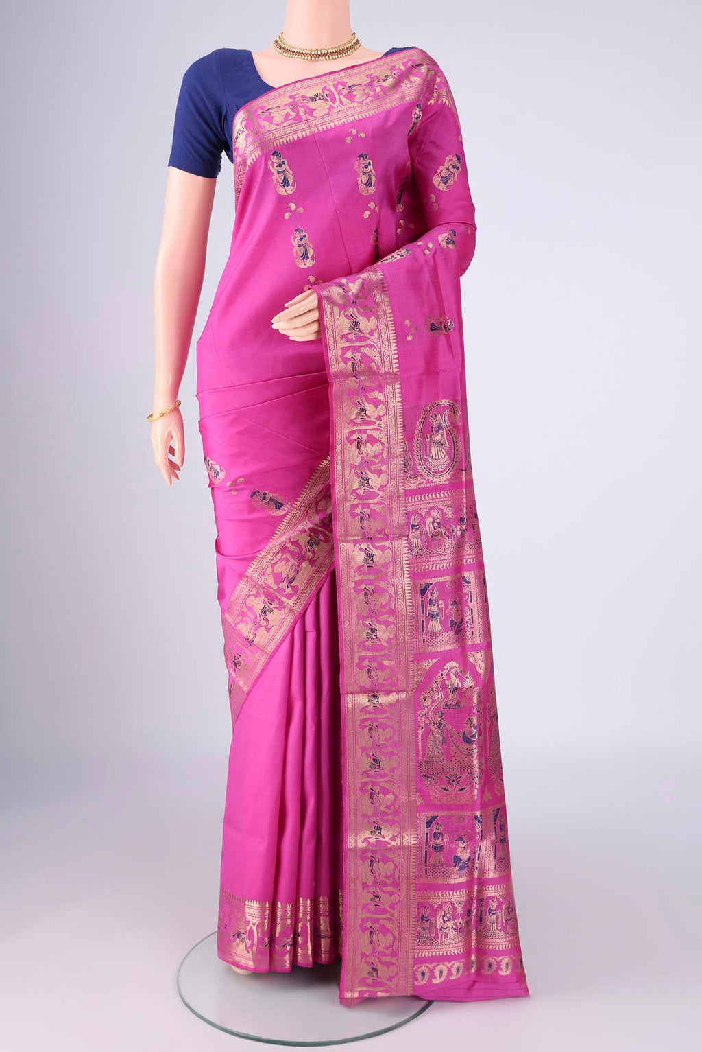 Pink Baluchari Silk Saree with Zari And Thread Butta on the body and Zari And Thread Border.  displayed on a mannequin