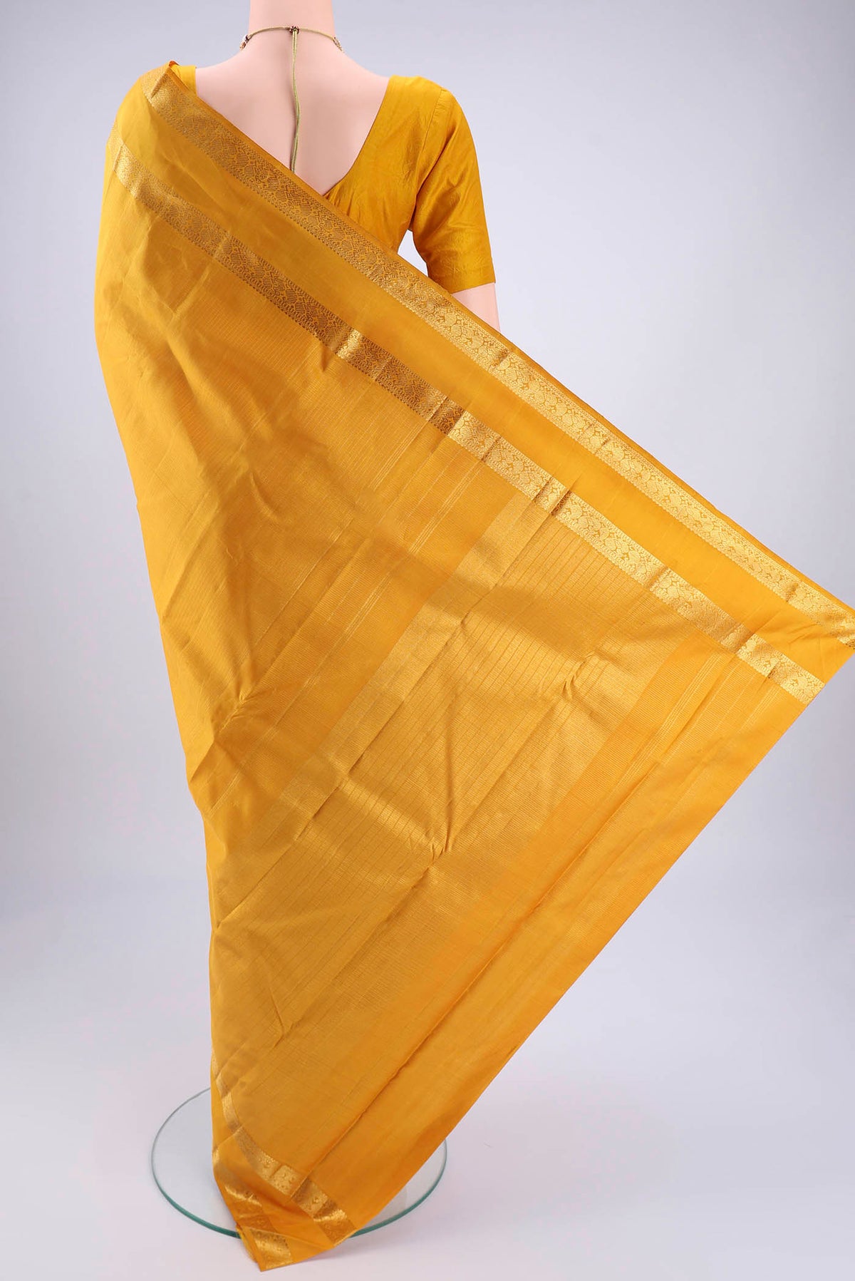 Flat view of Mustard Coimbatore Silk Cotton Saree with Checked design on the body and Zari Border. 