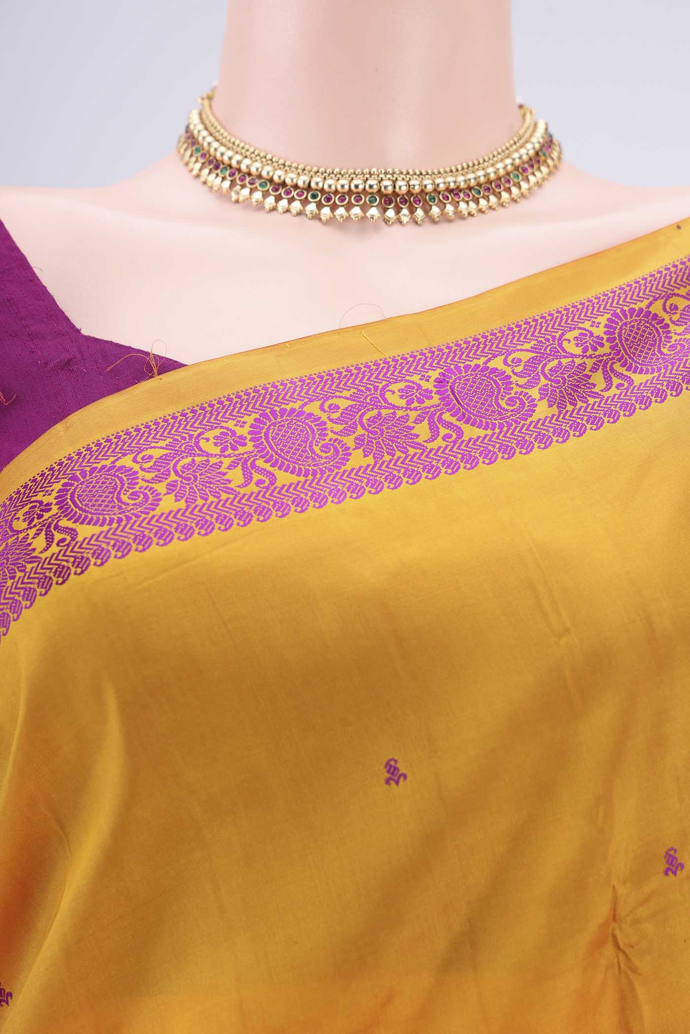 Border image of Mustard Kanchipuram Silk Saree with Thread Butta on the body and Thread Border. 