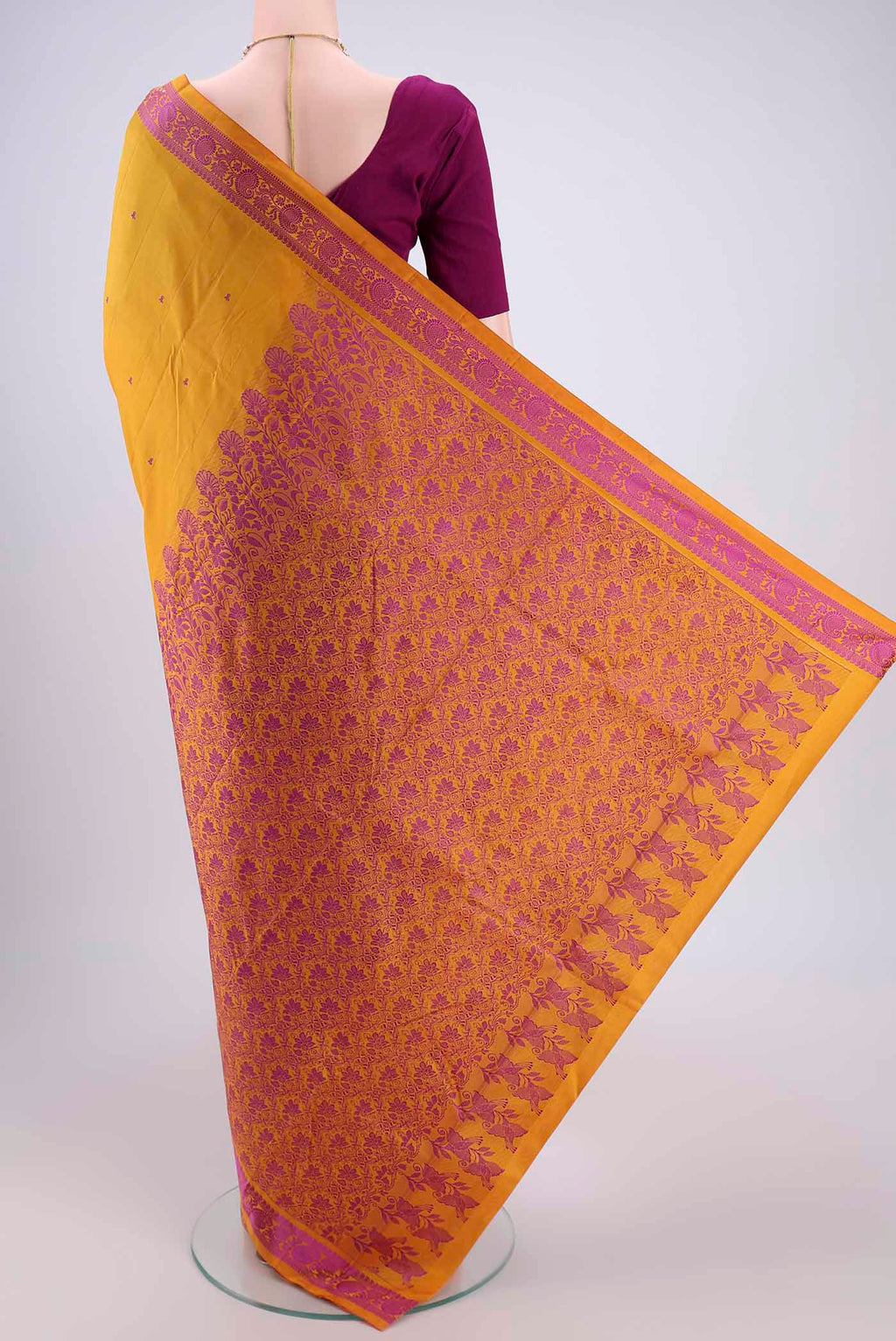 Flat view of Mustard Kanchipuram Silk Saree with Thread Butta on the body and Thread Border. 
