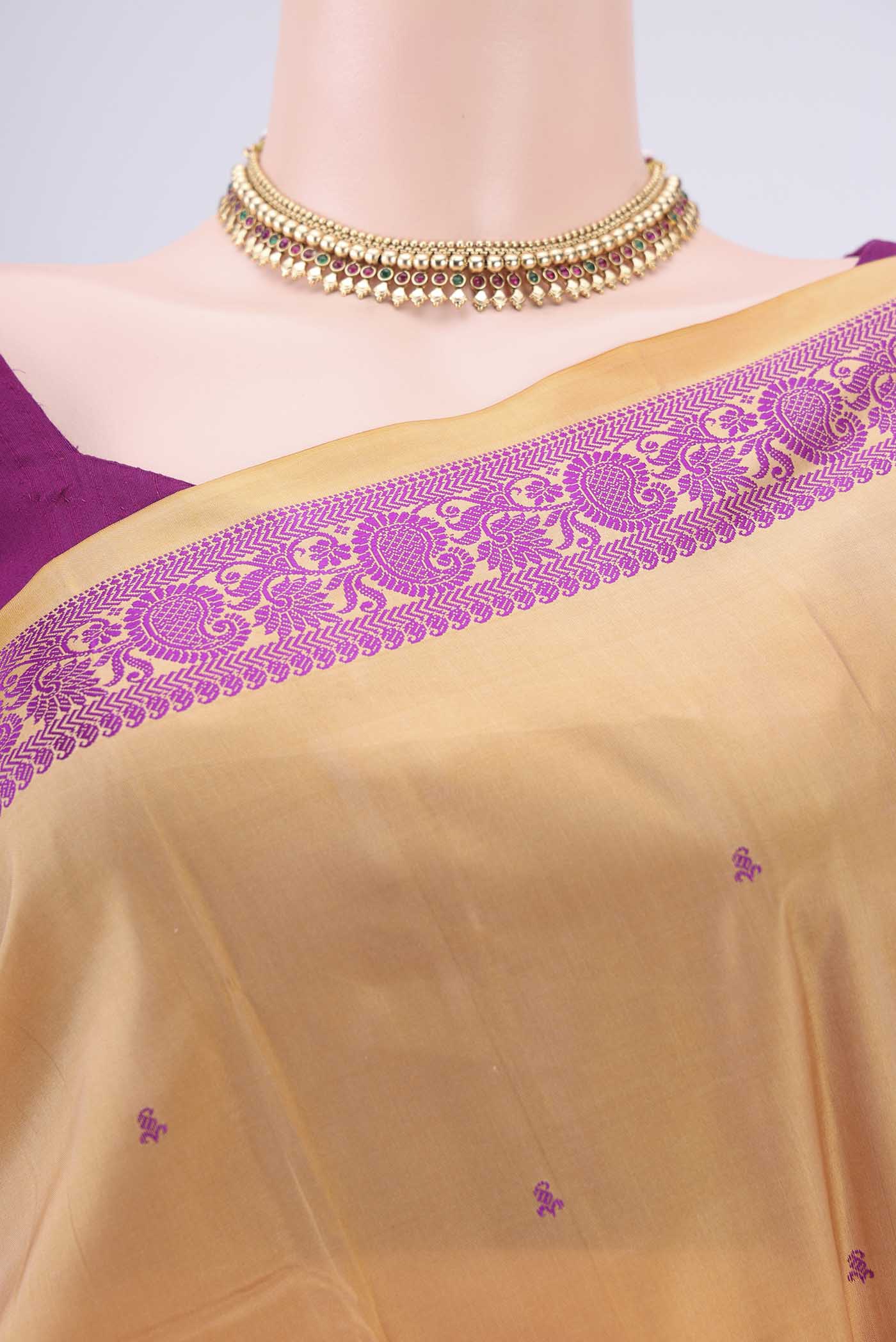 Border image of Sandal Kanchipuram Silk Saree with Thread Butta on the body and Thread Border. 